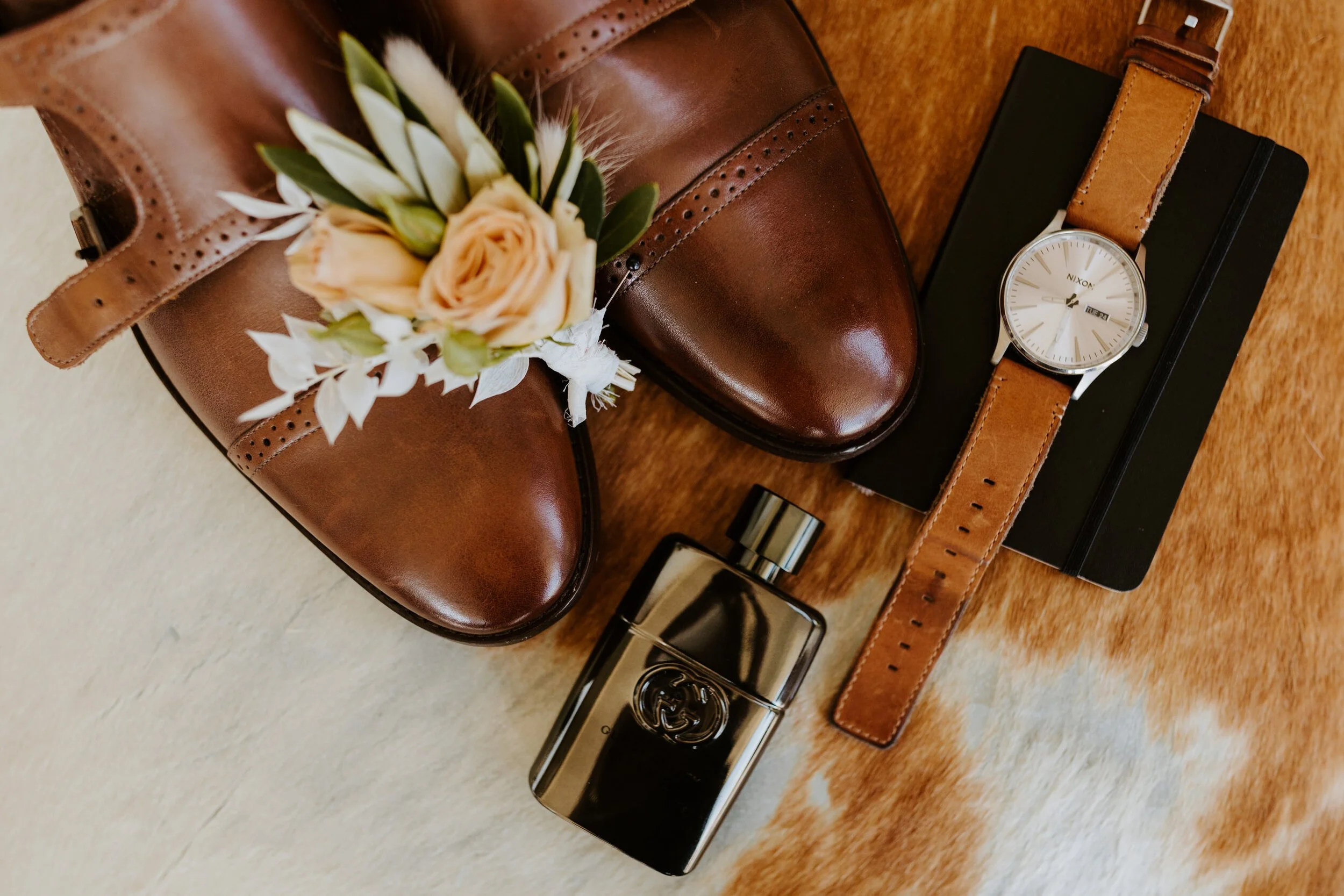 Groom wedding details, brown shoes, Gucci cologne, watch, boutonniere, Photo by Tida Svy