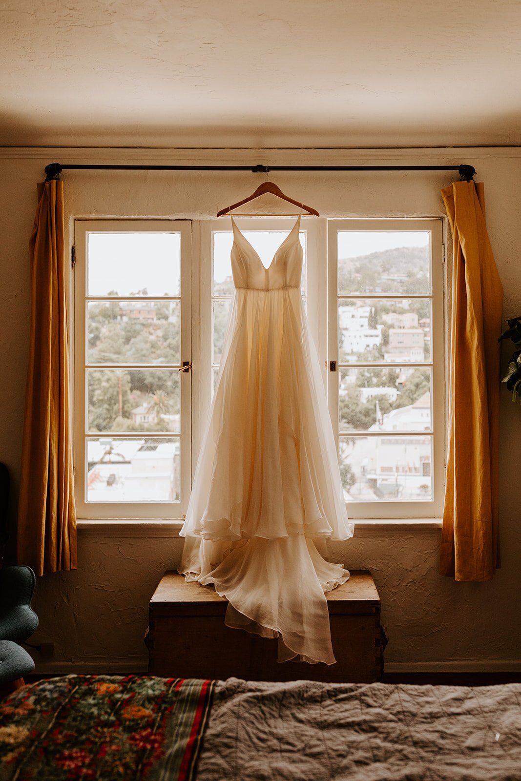 White dress hanging in window, Los Angeles airbnb wedding, zoom wedding, virtual wedding, covid wedding, Los Angeles elopement, Los Angeles Wedding Photographer, Photo by Tida Svy | www.tidasvy.com