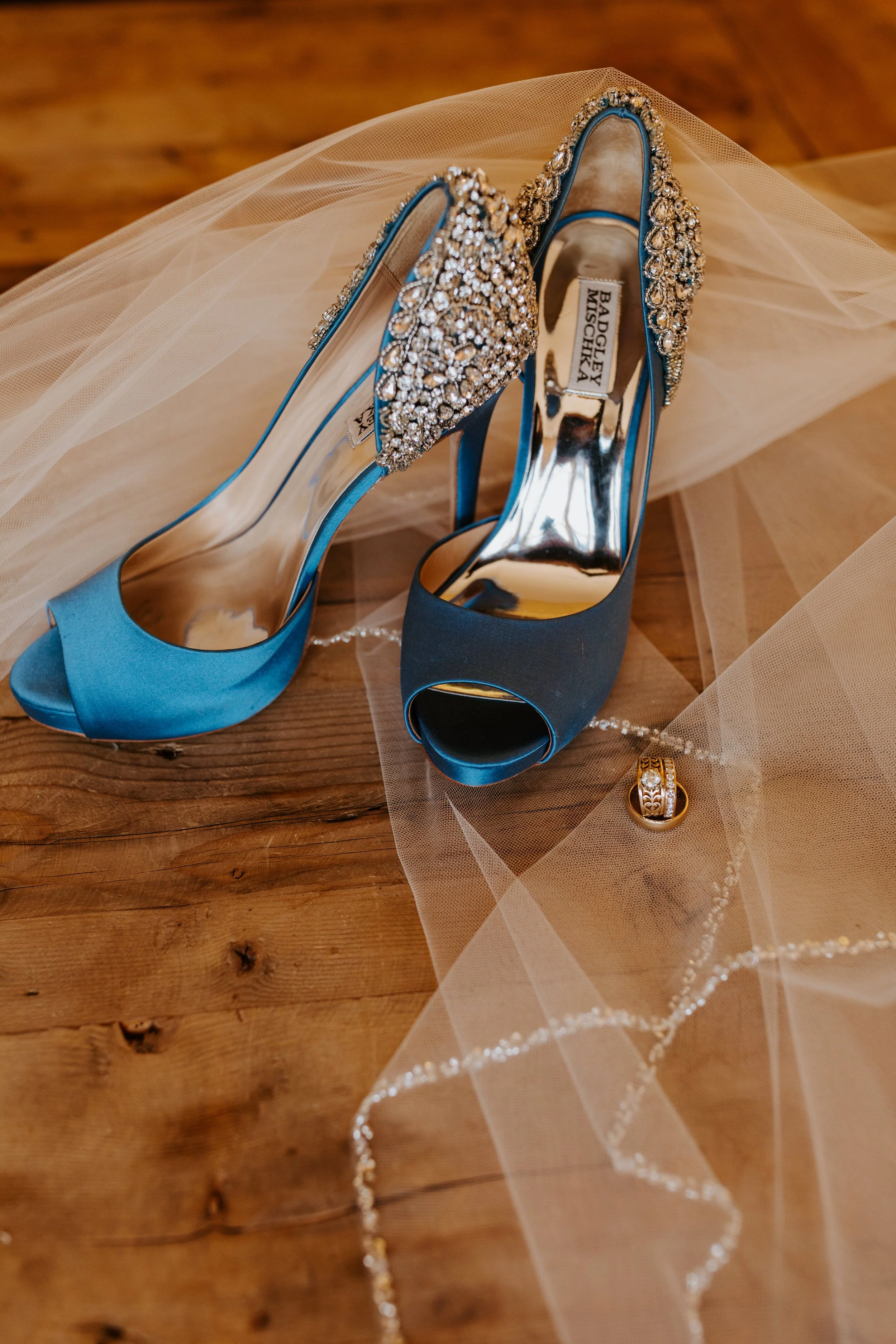 Blue badgley mischka shoes, veil, and ring detail shot | Newhall Mansion Wedding | Piru, CA | Southern California Wedding Photographer | Photo by Tida Svy | www.tidasvy.com
