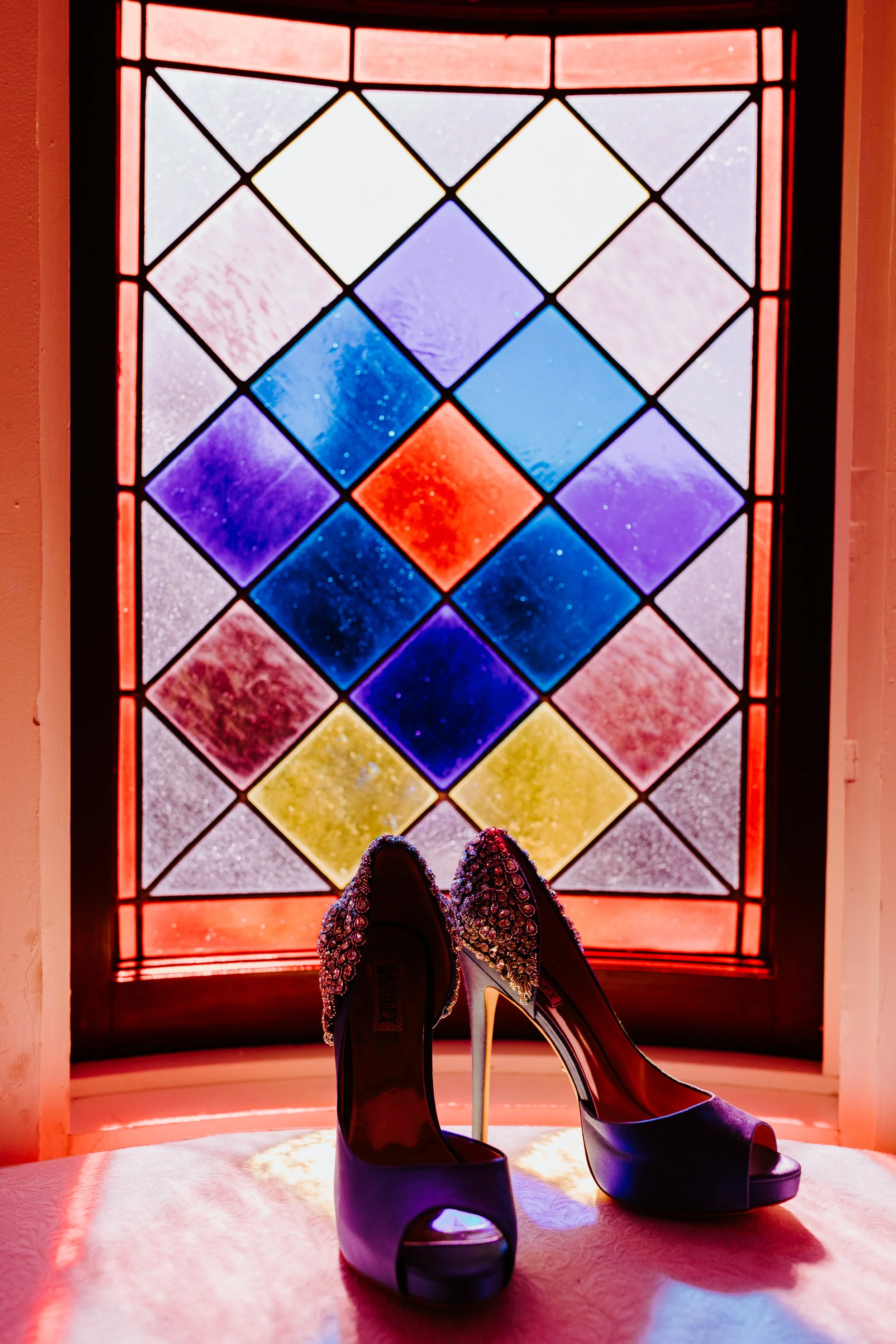 Stained glass wedding shoe photo | Newhall Mansion Wedding | Piru, CA | Southern California Wedding Photographer | Photo by Tida Svy | www.tidasvy.com