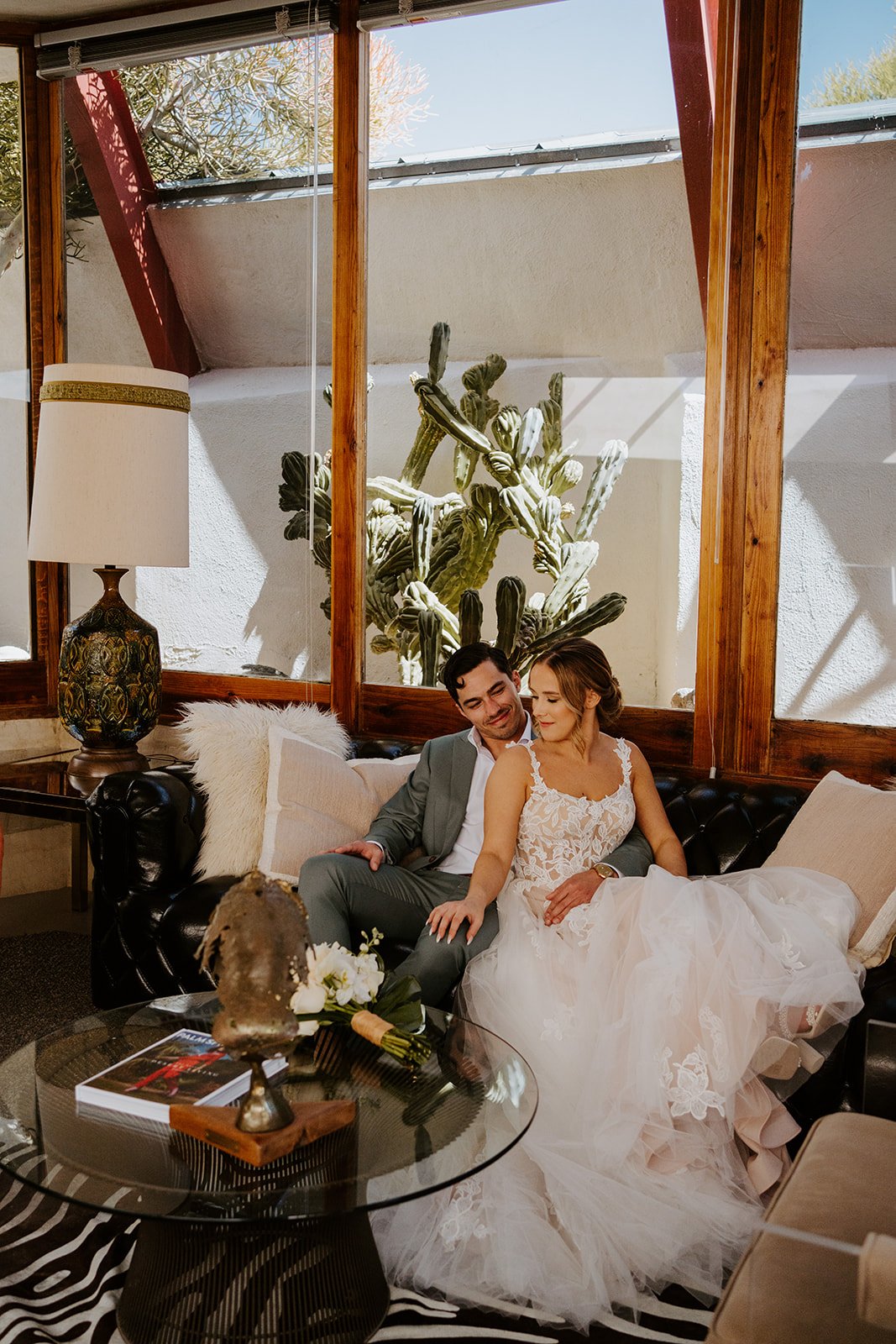 Couple wedding portrait at The Lautner Compound mid-century modern venue in Palm Springs by Tida Svy