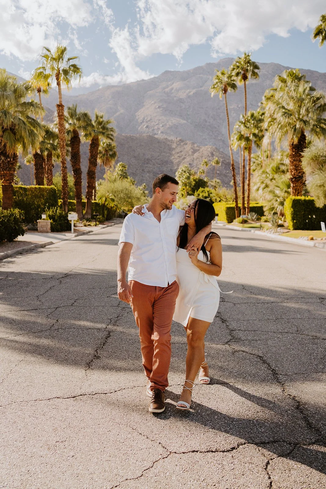 Engagement photo session in Palm Springs neighborhood with San Jacinto Mountains in the background by Palm Springs wedding photographer Tida Svy