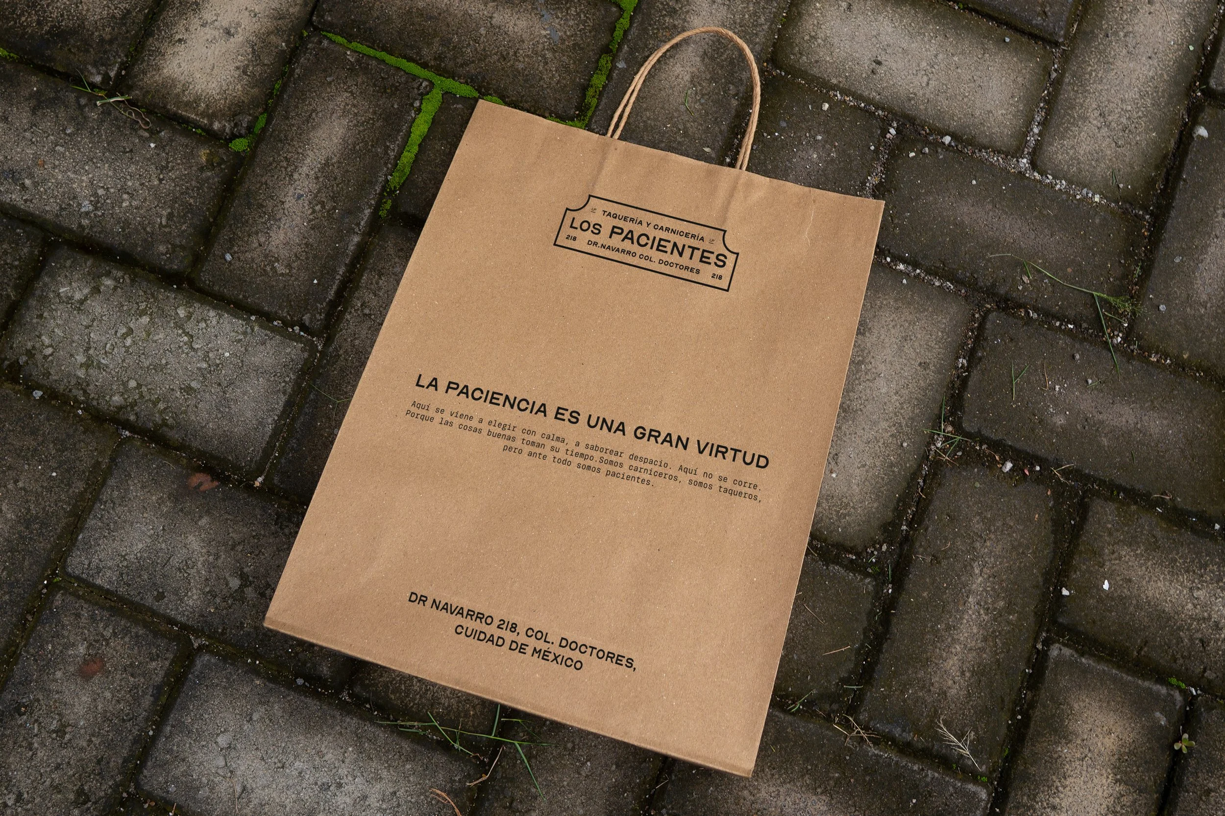 Brown Paper Bag Mockup on the Pavement.jpg