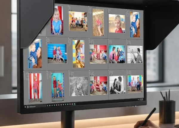 Professional photographer's monitor showing a series of digital family photographs being carefully edited by Natural Family Photography.