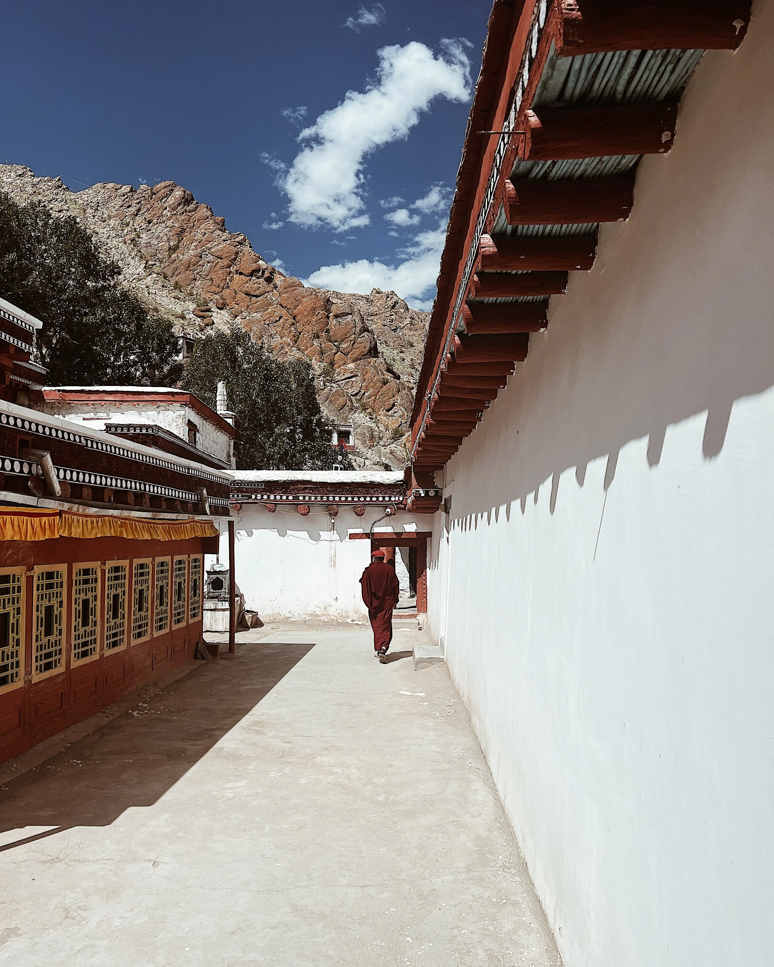 Monk walking through Hemis Monastery, Ladakh