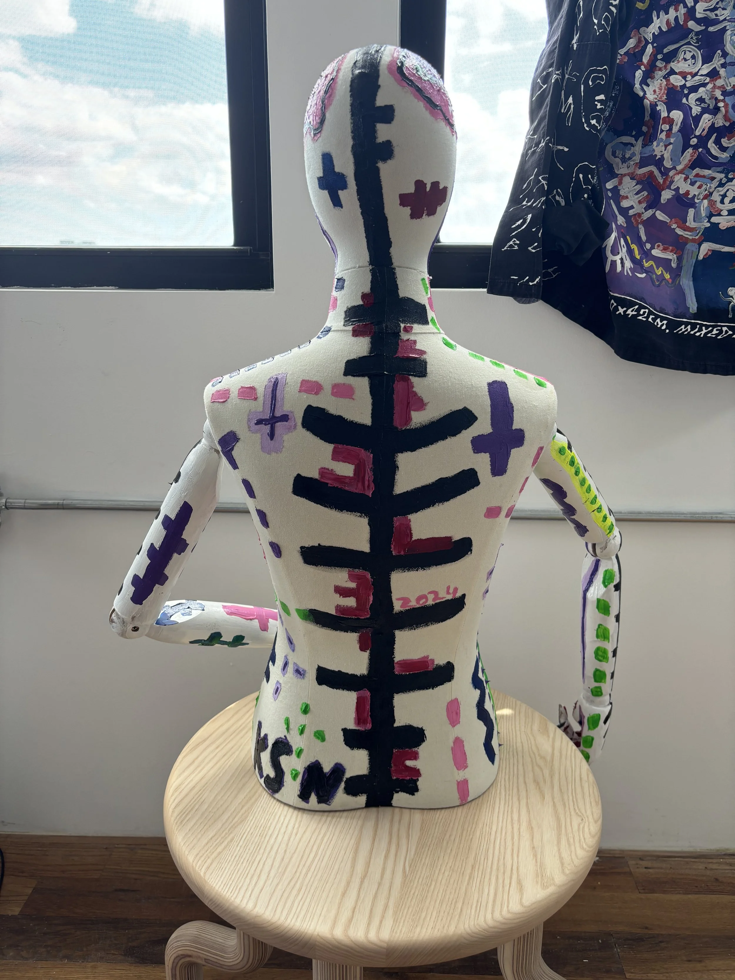 First There Was The Wound /
Back 