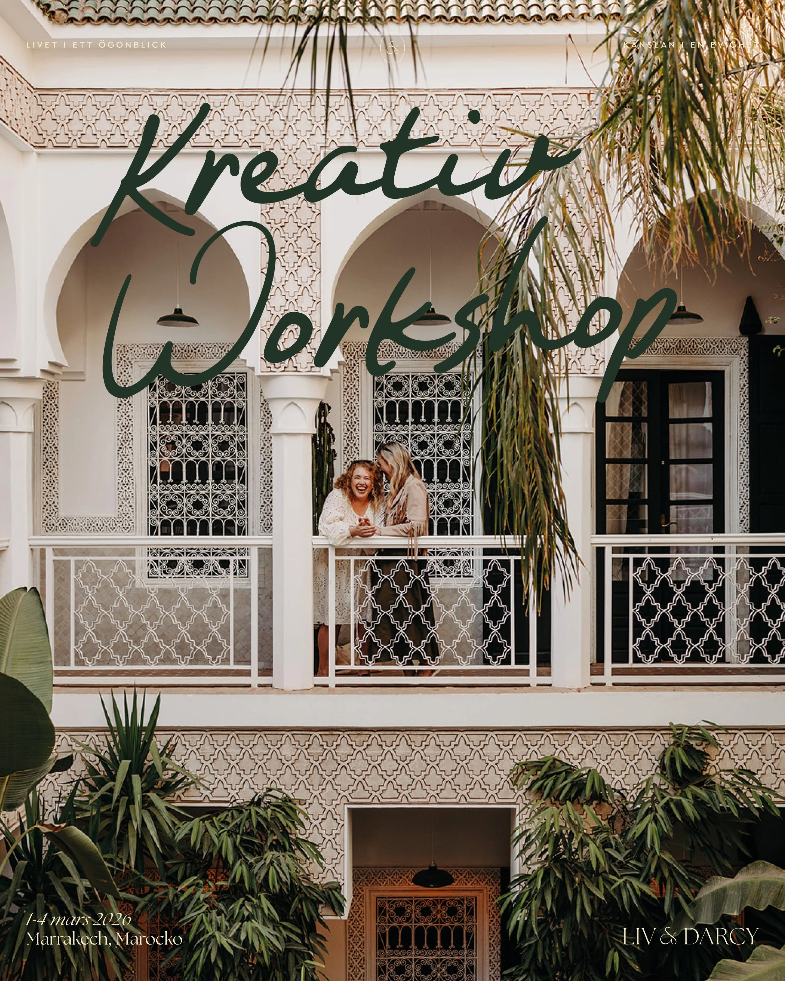 Two women standing on a balcony, smiling and talking, in front of Moroccan-style architecture with intricate white wrought-iron designs and arched window openings, surrounded by lush green tropical plants.