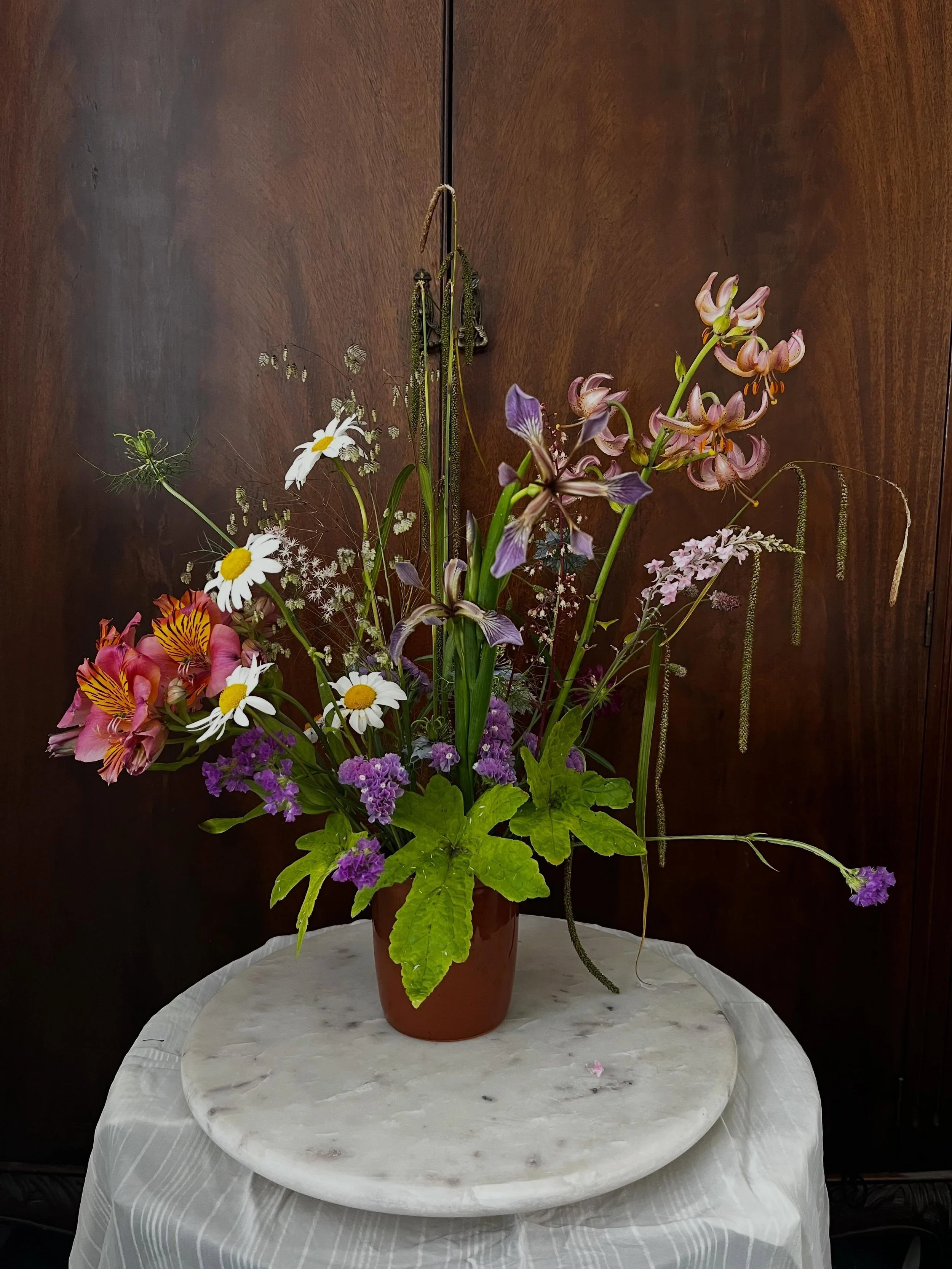 June Pickle Jar

Exclusively Irish blooms. The iris I discovered in the back garden when hanging out some washing in between showers. 

Designed with blooms grown by @ameliasgardenflowers &amp; @bellmeadowflowers, and a scattering from my little cour
