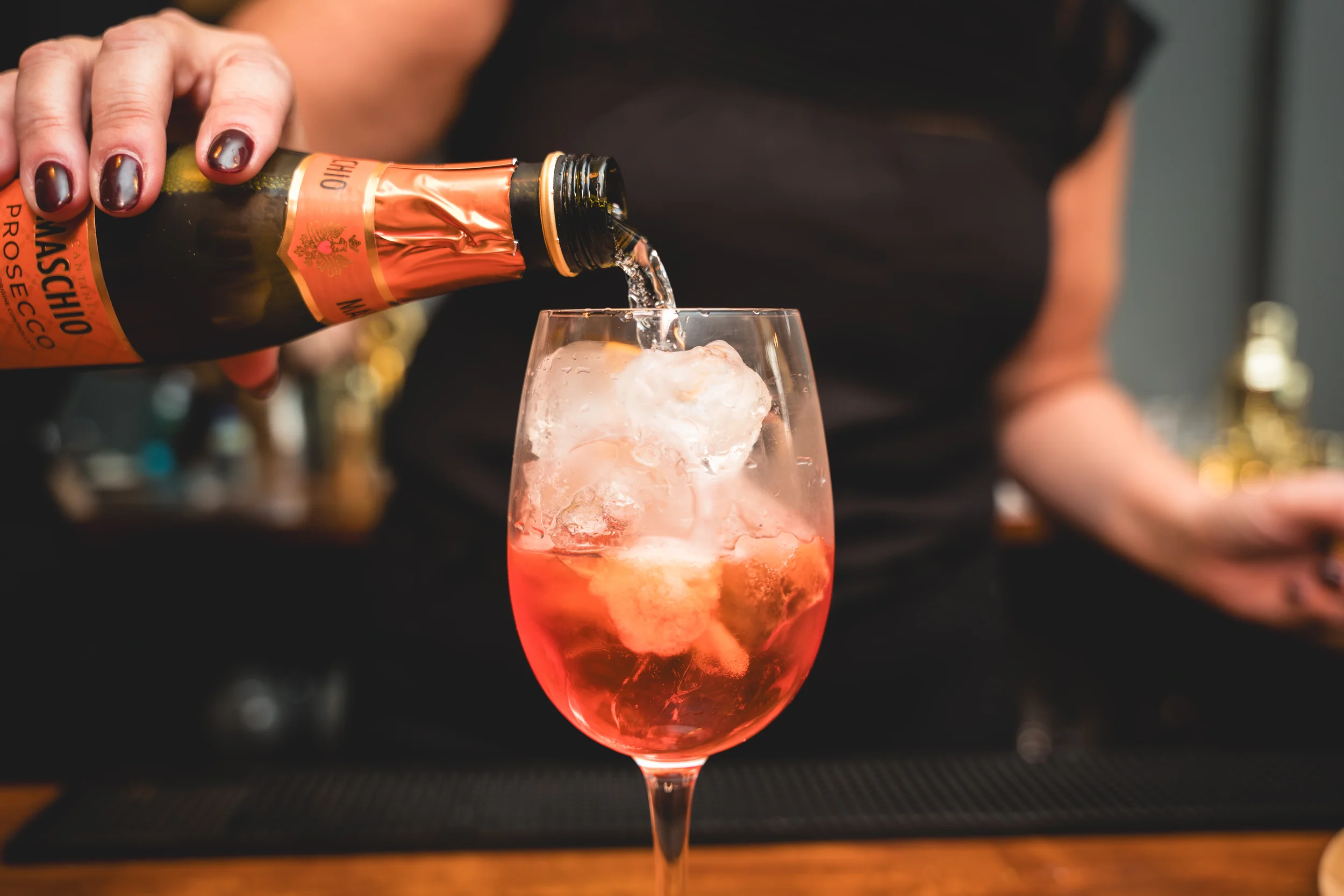 Cocktail being poured