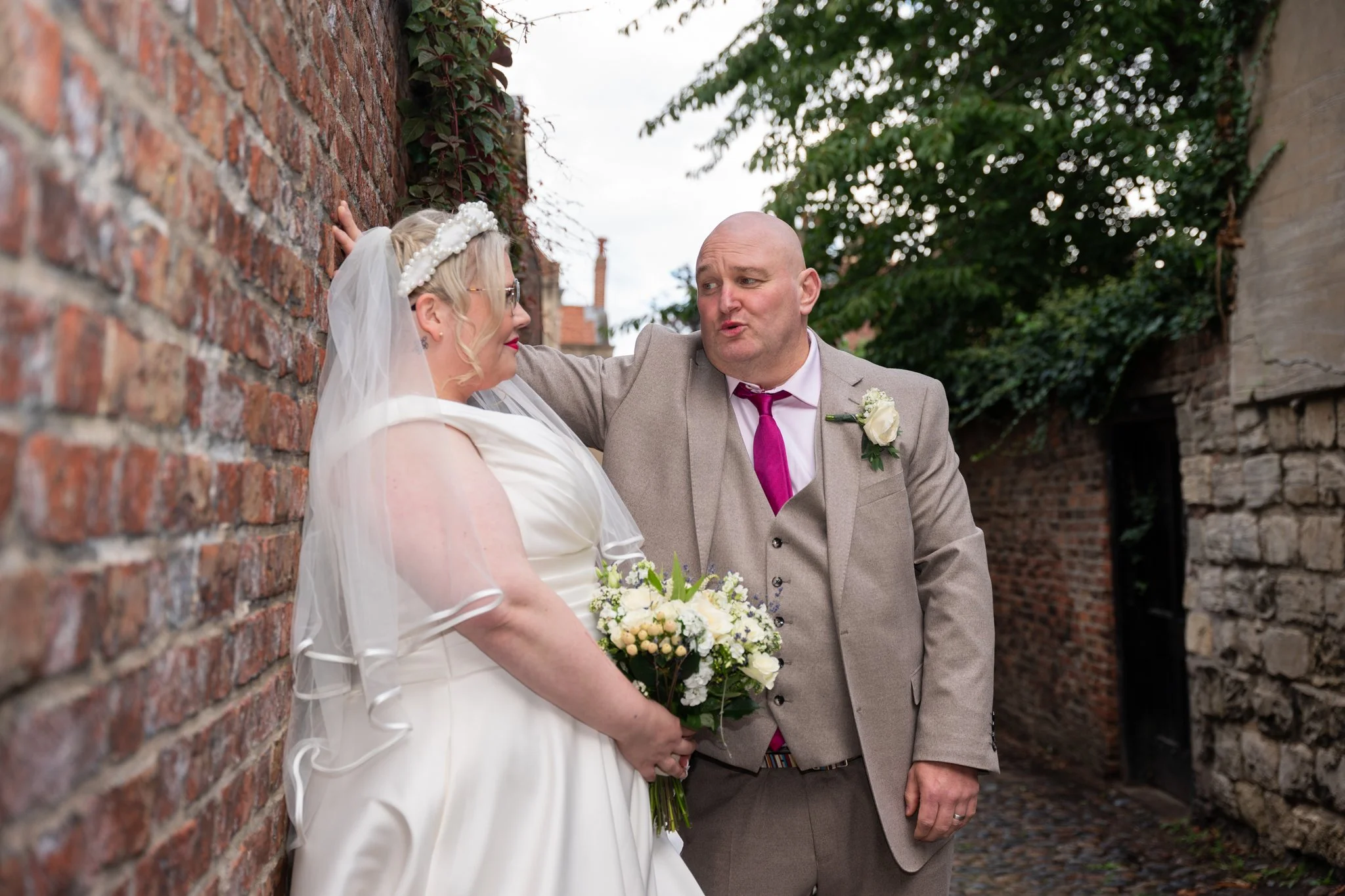 Bride and groom sharing a funny moment