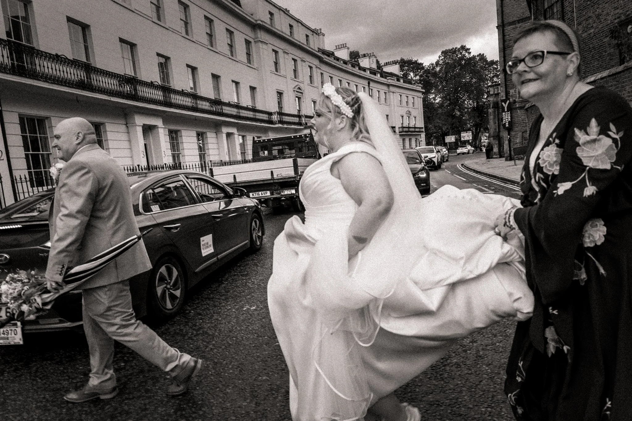 Bride and Groom and Mother-in-law dash across the street