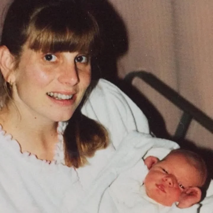 This is me about six hours after I had my second baby. I was in my postpartum hospital room that I shared with another mom/baby and her husband took this polaroid photo. A few hours after birth, I had sent my post-call-sleep-deprived-medical-resident