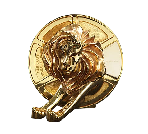 Golden award medal with a lion's head and paws design.