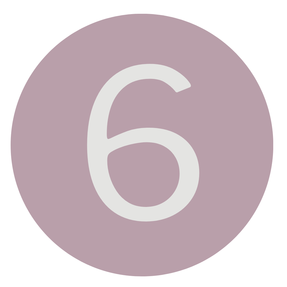 A purple circular sign with the white number 6