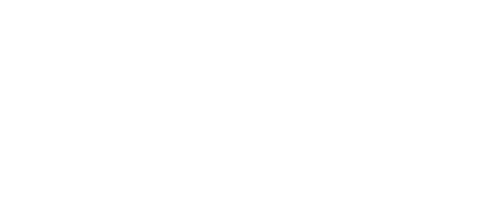 A white background with a small, centered, gold-colored object.