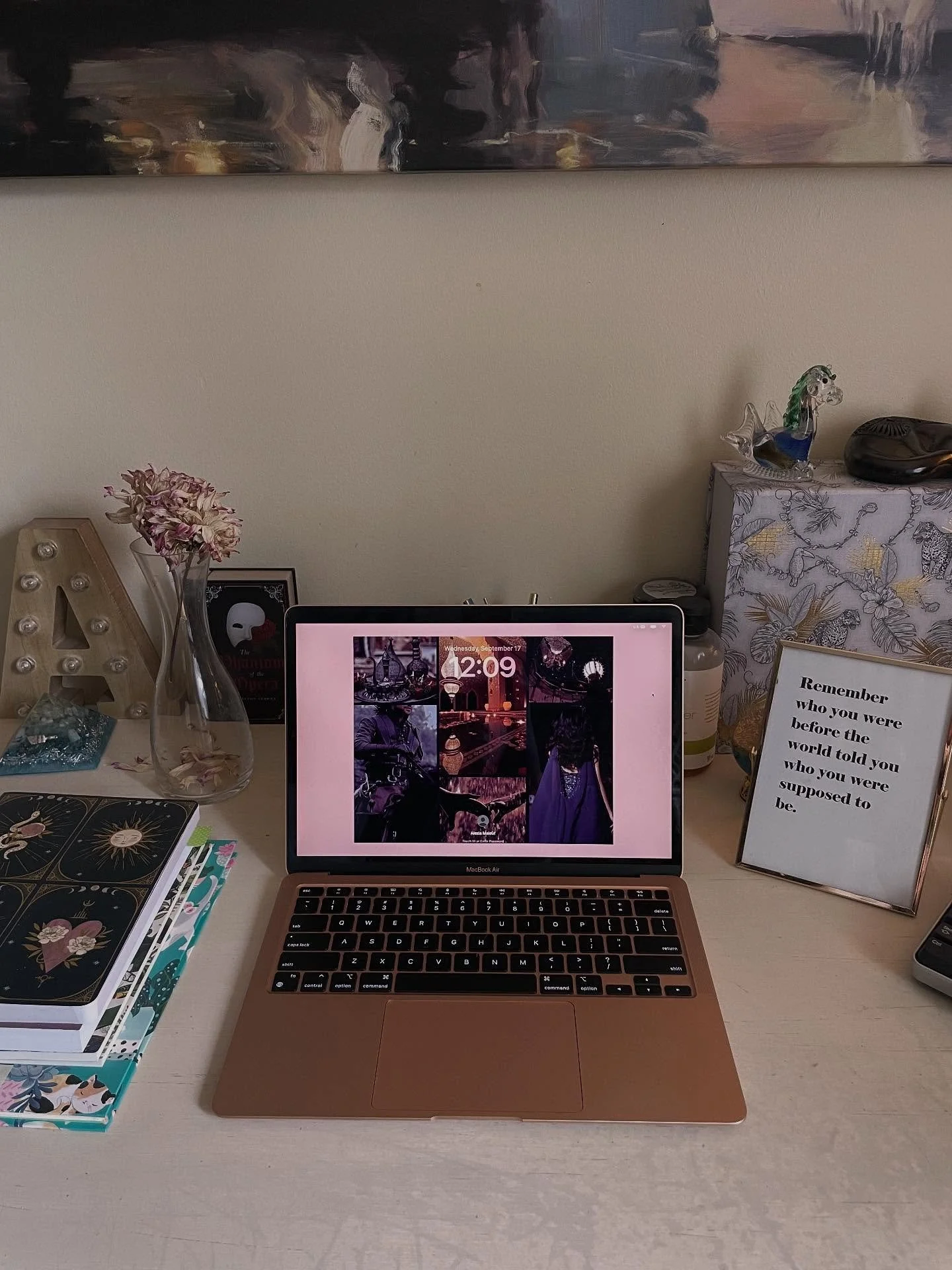 Today&rsquo;s #smoochwait prompt is to share our work setup. This is my current little writing nook on the L-shaped desk I share with my day job.

A few fun facts:

💫 The wallpaper on my laptop is a collage I made several years ago to represent HF. 