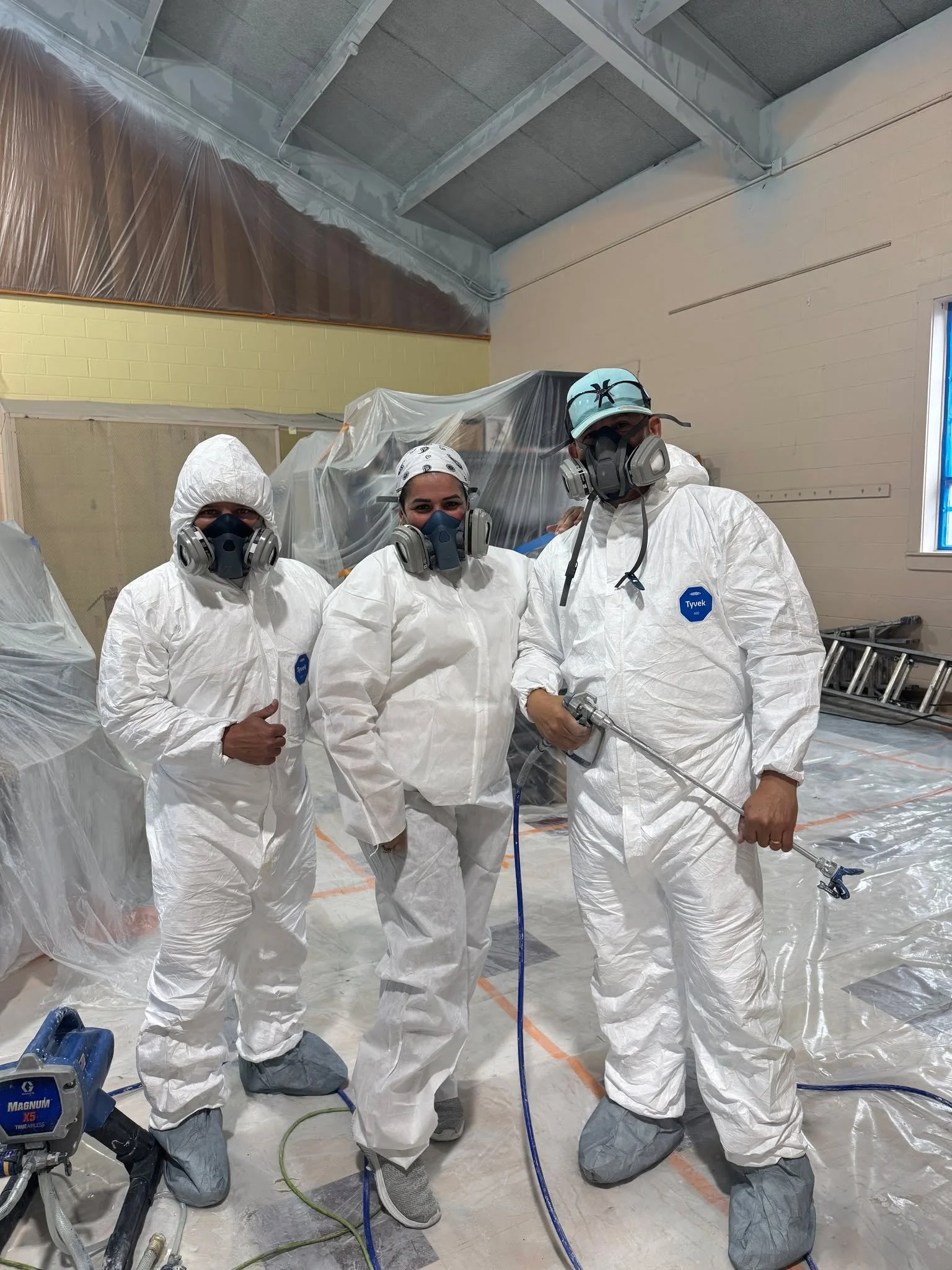 Check out our crew decked out in their new PPE gear!

On certain painting and coating projects, especially when spraying or working with industrial coatings, proper PPE is essential. Respirators, protective suits, gloves, and eye protection help prot
