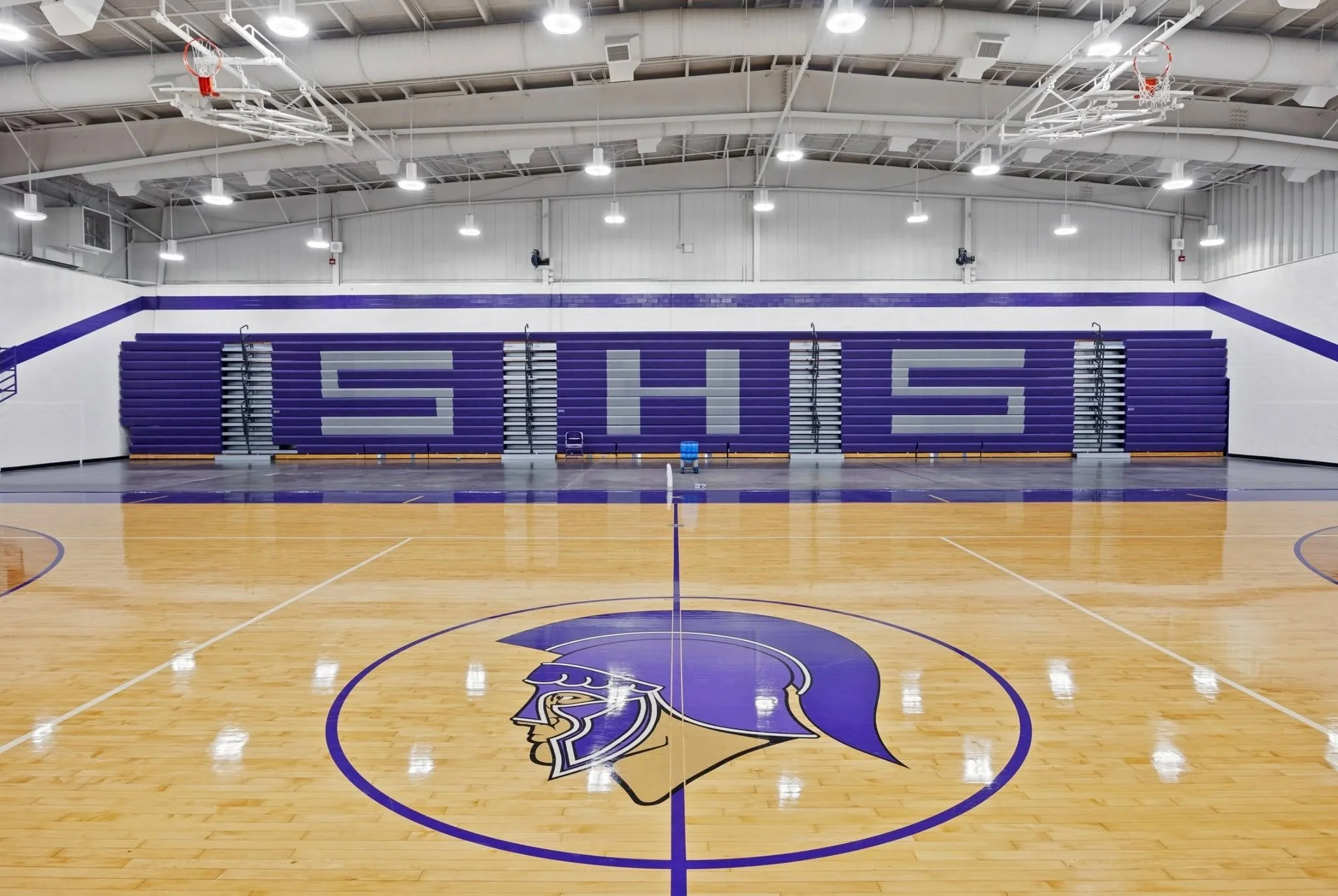 We recently had the opportunity to give the gym and vestibule at Southern High School a fresh new look!

Our team repainted the walls, ceiling, stripes, and trim throughout the gym. Two electric scissor lifts helped our crews safely reach every corne