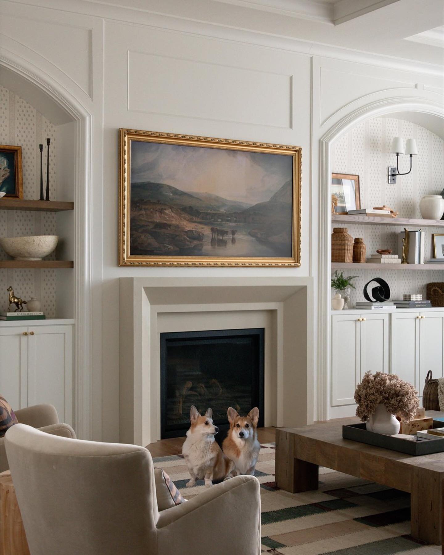 Our clients wanted a home that felt all grown up. We decided arched builtins and millwork would do just the trick!  And of course their adorable Corgi&rsquo;s made the shot list. 🐾. #builtinshelves #houseremodel #tricitieswashington #familyroomdesig