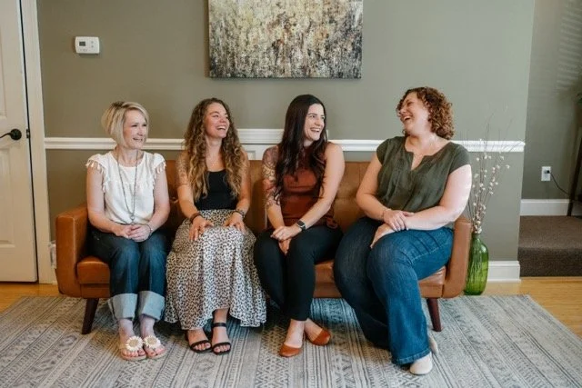 Therapists smiling together