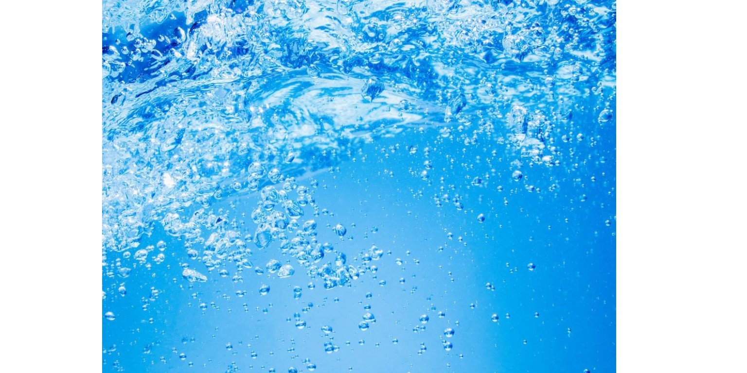 Underwater scene with air bubbles in blue water