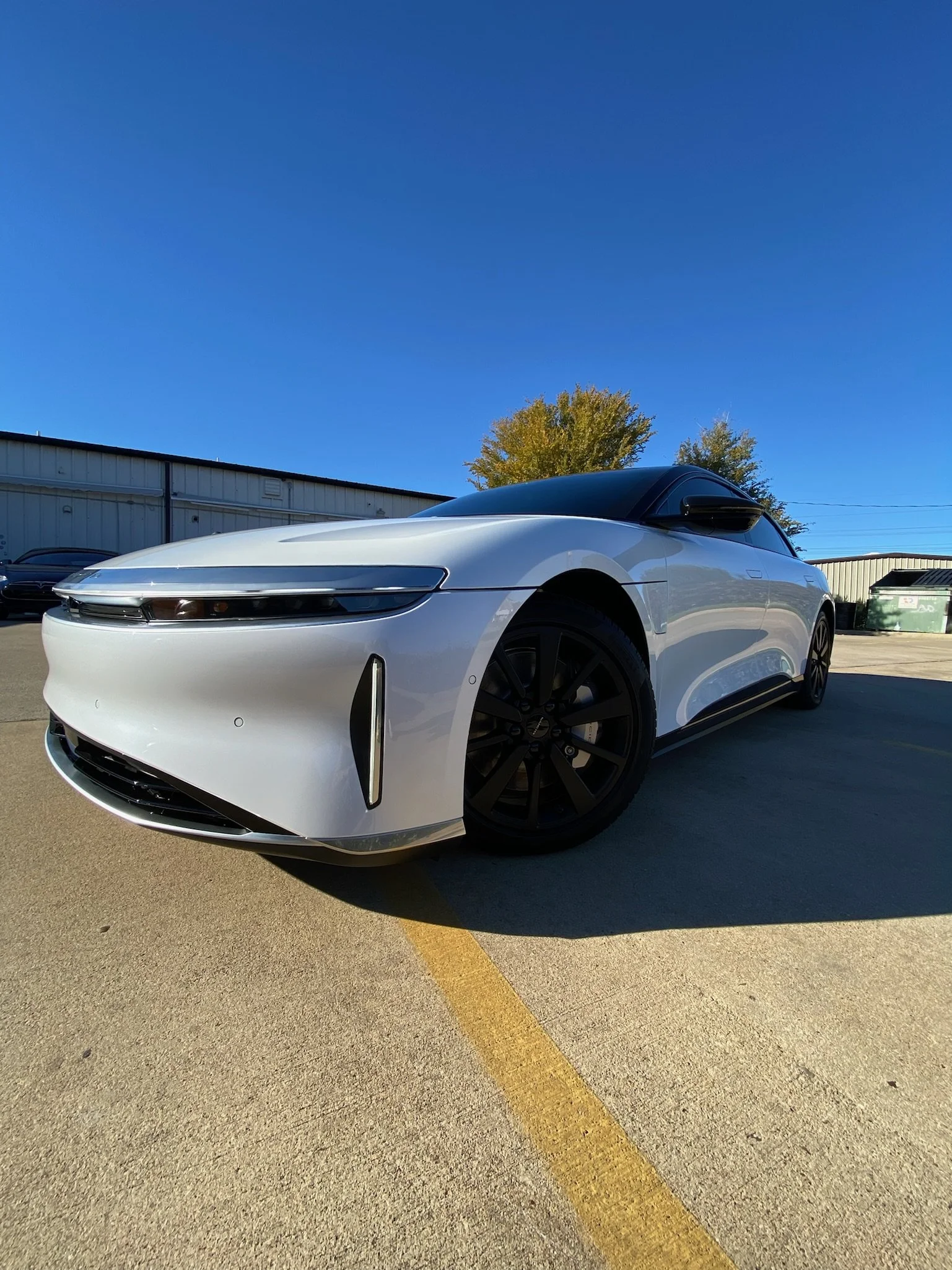 white Lucid Air with dark tinted windows