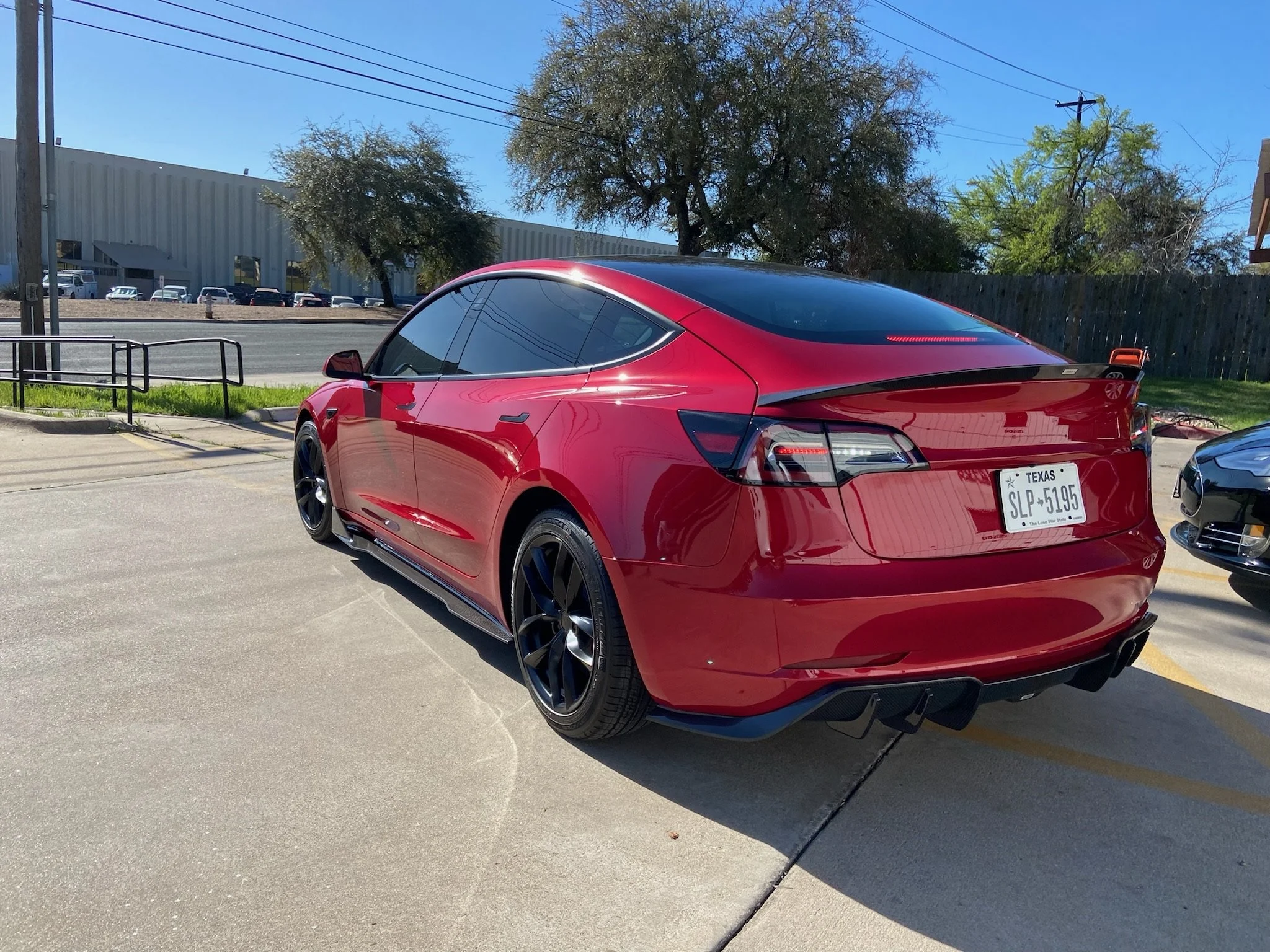 red Tesla Model S with body modifications