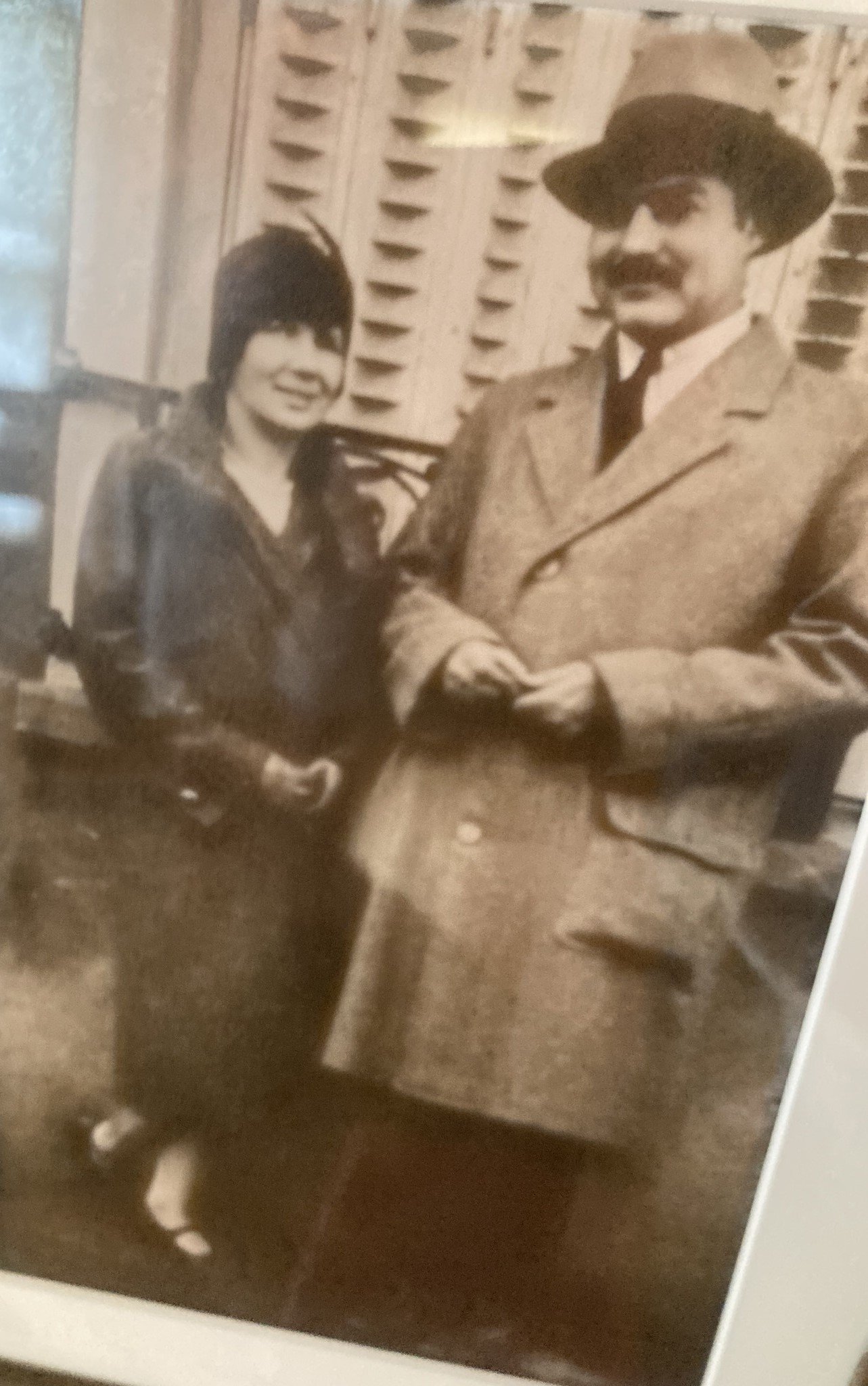 Pauline and Ernest photo on wall in Piggott.jpg