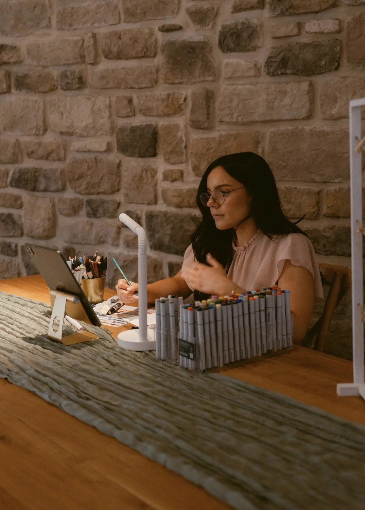 live wedding illustrator drawing guest portraits at Stretton Manor Barn