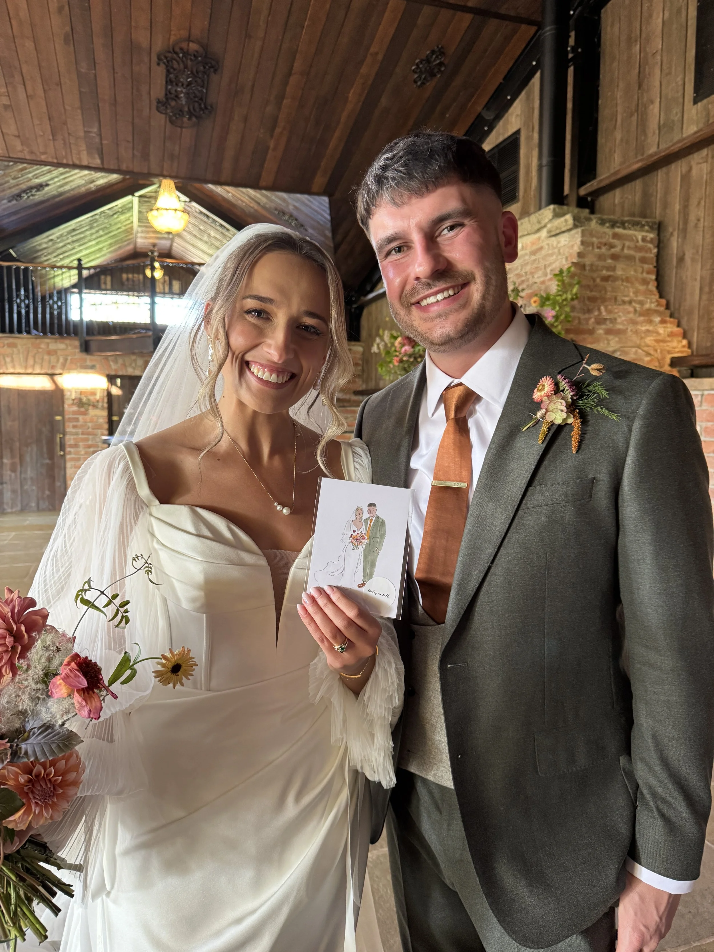 couple holding their live wedding guest portrait illustration at wedding reception