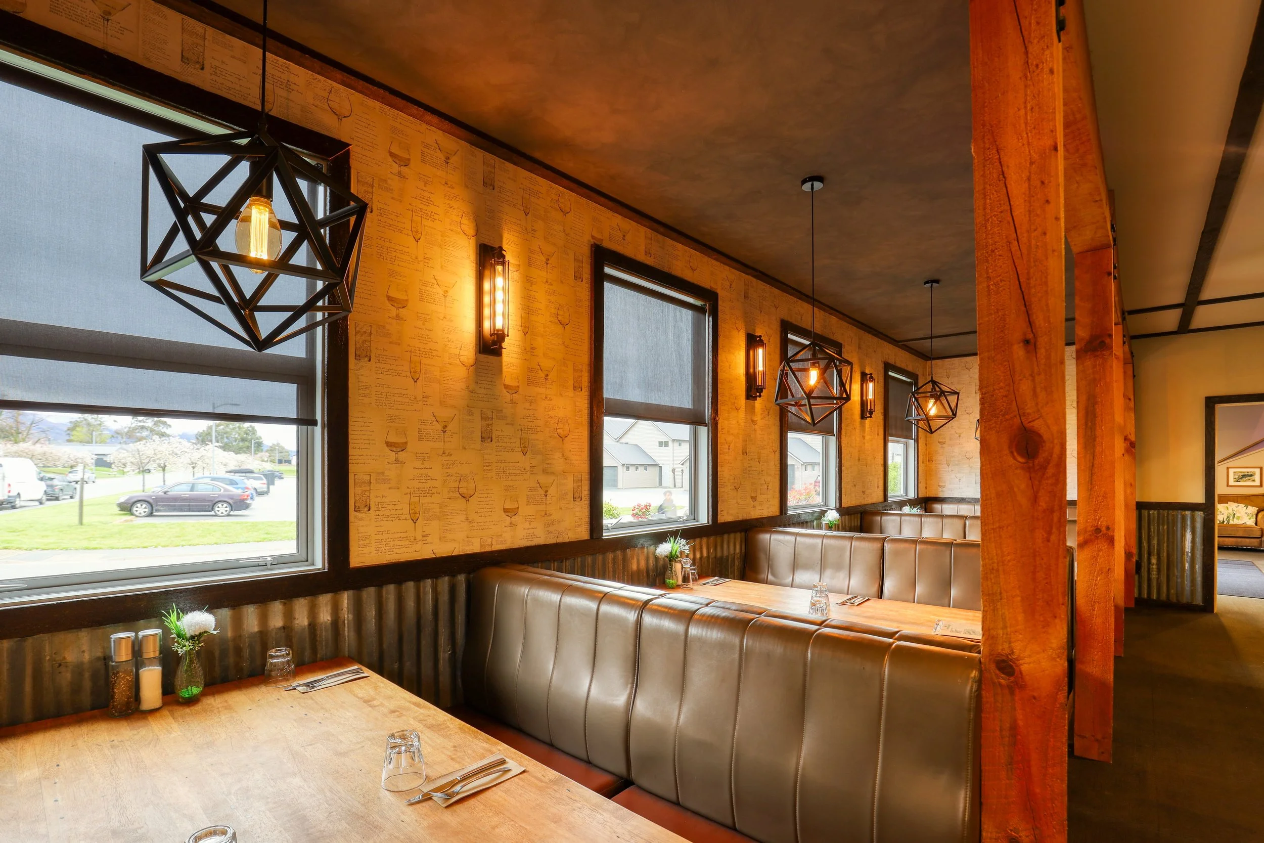 Moorings Restaurant at Lake Resort in Cromwell with comfortable booth seating and a warm lakeside dining atmosphere.