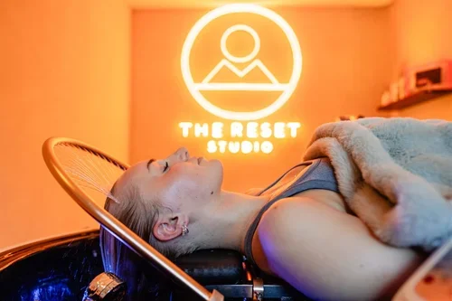 Woman relaxing during a Japanese head spa treatment at The Reset Studio in Cromwell, Central Otago.