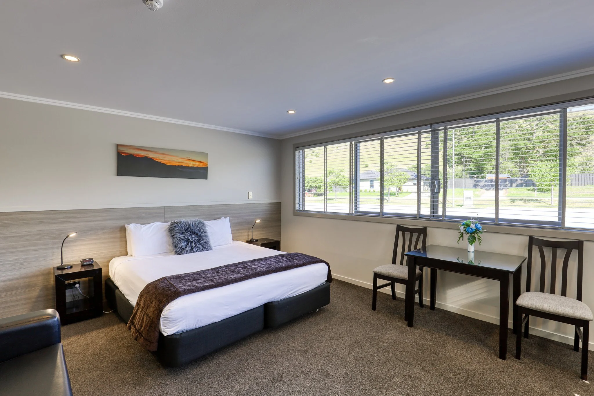 Mountain View Studio accommodation at Lake Resort in Cromwell with a king bed, modern amenities, and scenic mountain views.