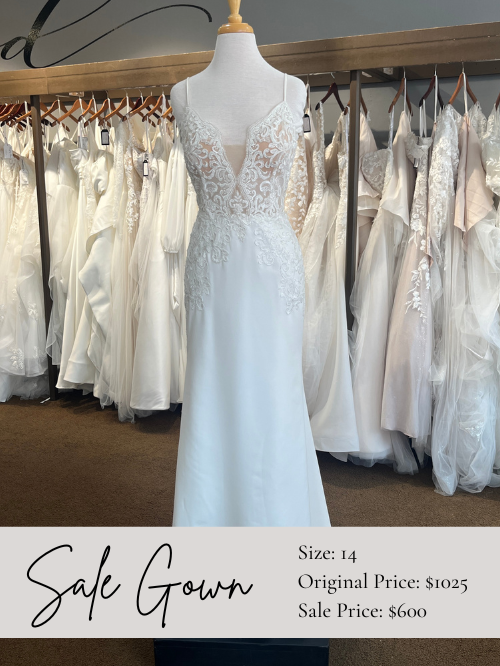 Fitted lace and crepe wedding dress
