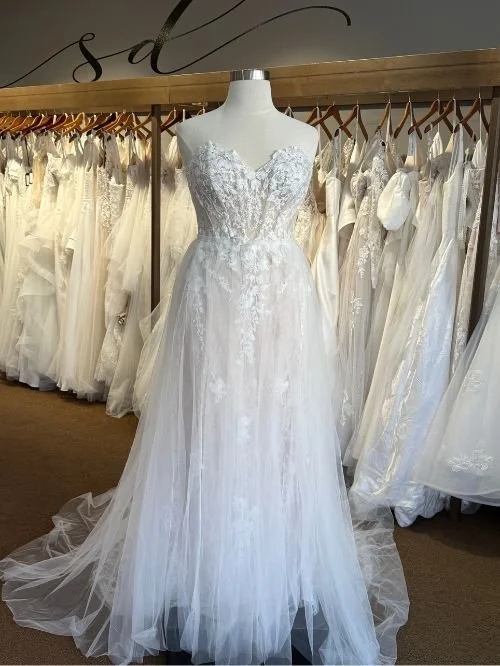 Fitted wedding dress with overskirt