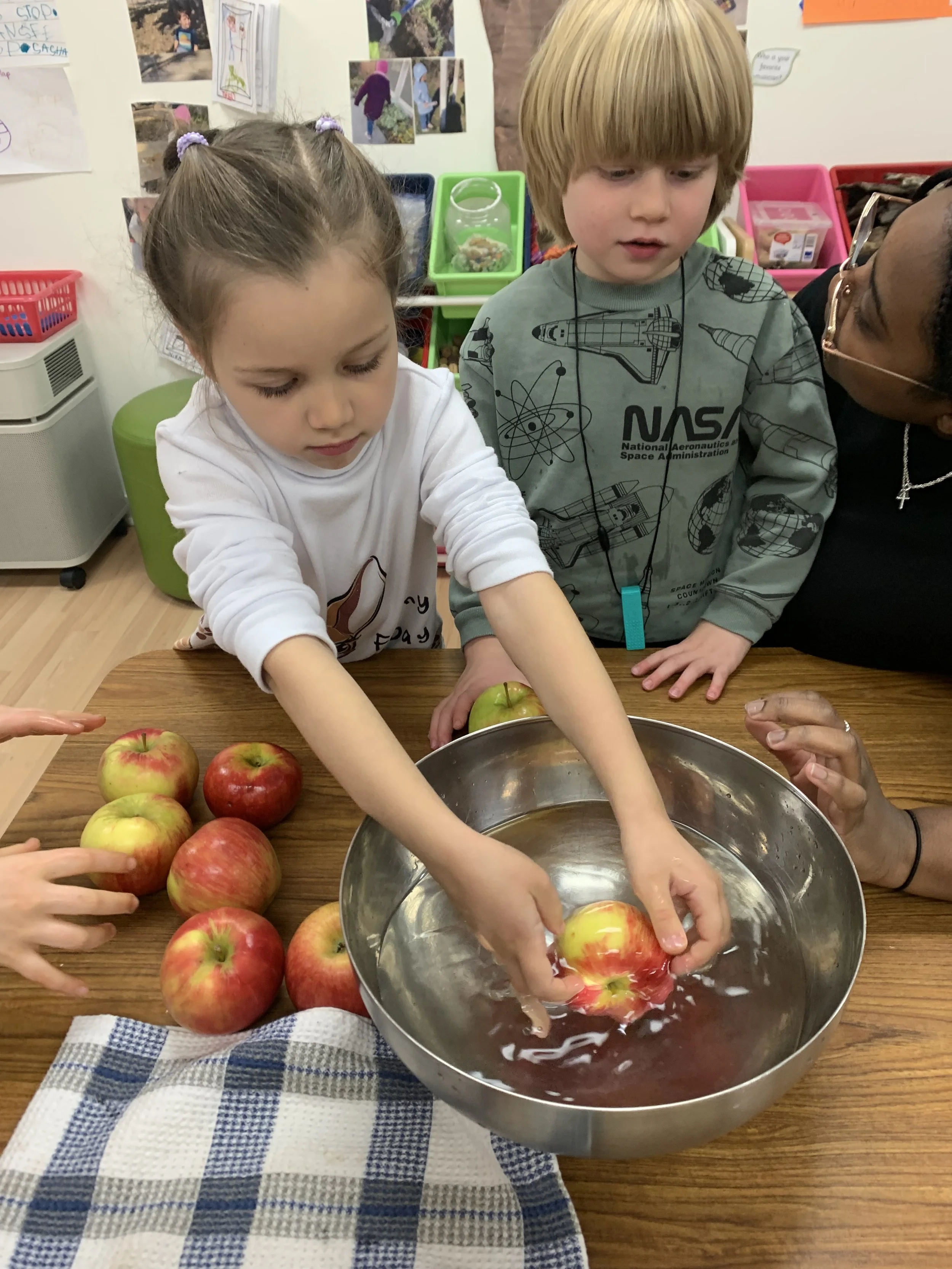 Students applying concepts through a hands-on activity that connects learning to real-world understanding