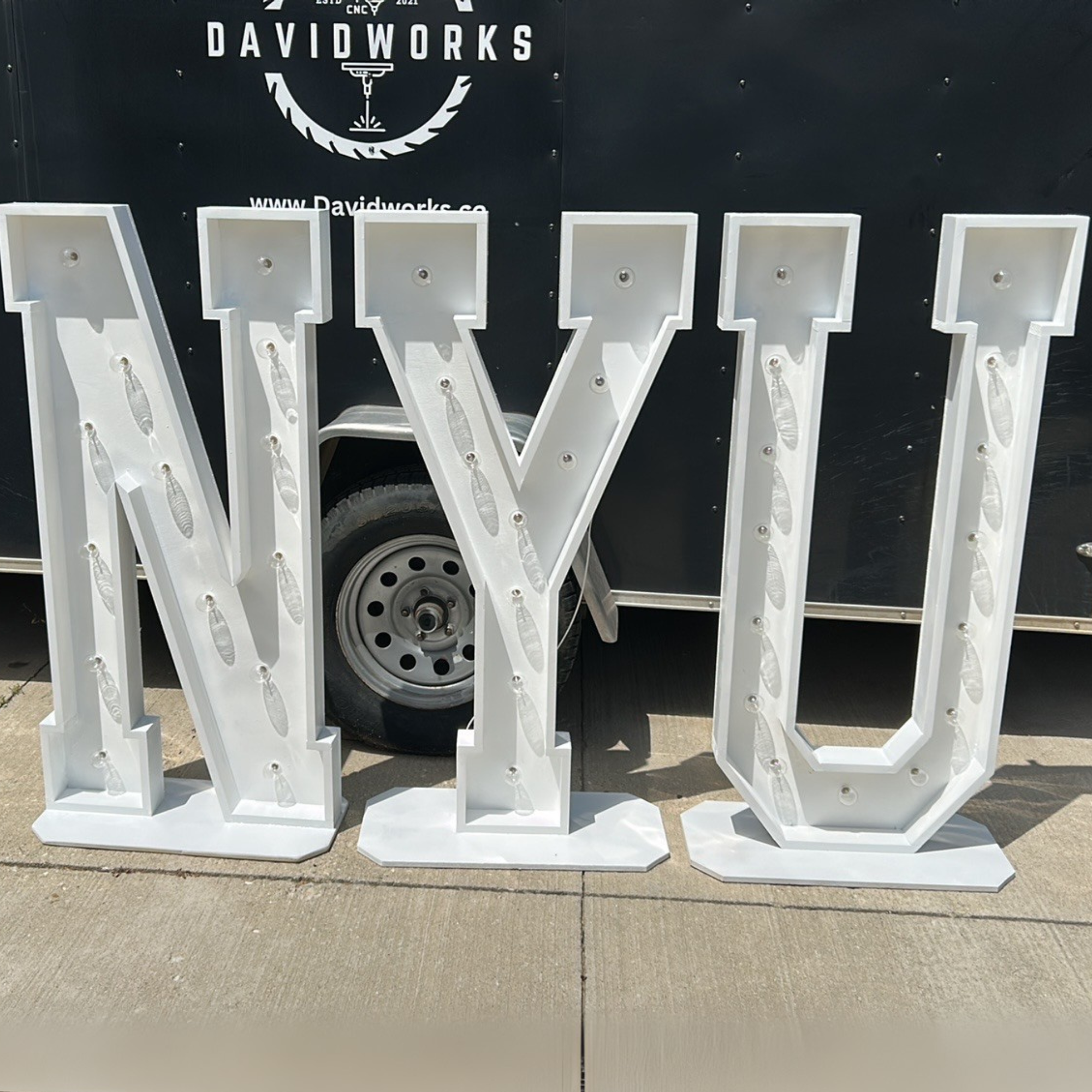 college-marquee-letters-nyu-graduation.png