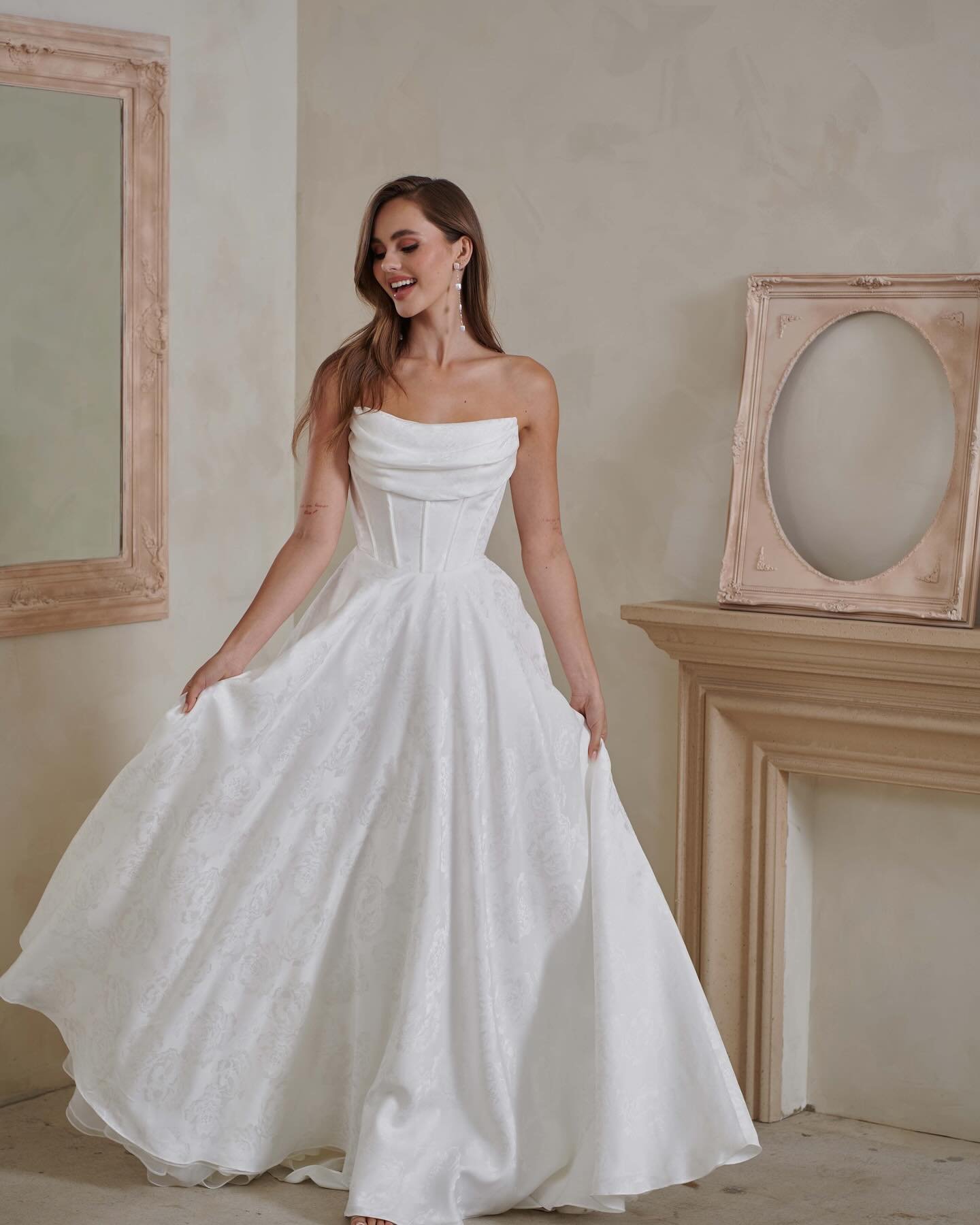 A favorite of mine, &lsquo;Greer&rsquo; by @serenebymadilane is an embodiment of elegance and charm. 

With the florals, the neckline, and the silhouette, this is a perfect romantic wedding gown. 🤍🕊️ 

If you love Greer, schedule your appointment t