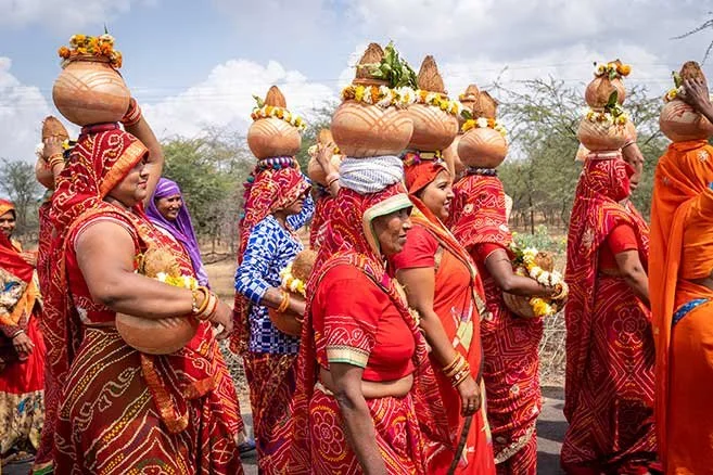 Holi_Pilgrimmage_women-in-orange.jpg