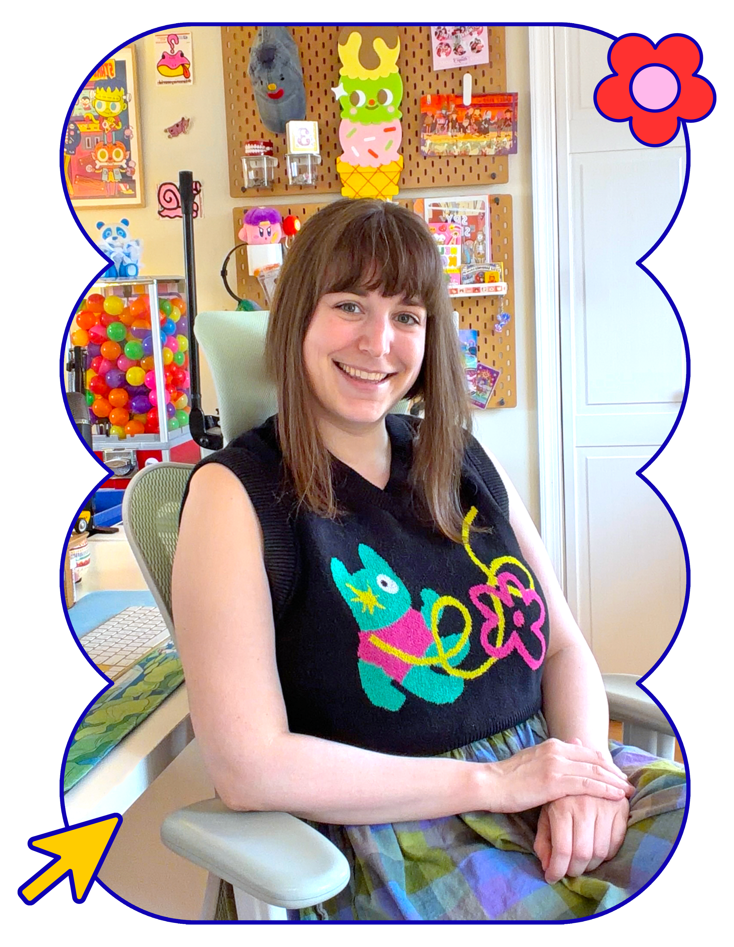 Philadelphia illustrator and designer Kelly Nichols seated in her colorful home studio.