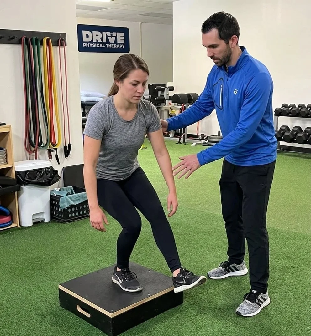Patient working with a provider at a performance physical therapy clinic in Saratoga Springs, NY