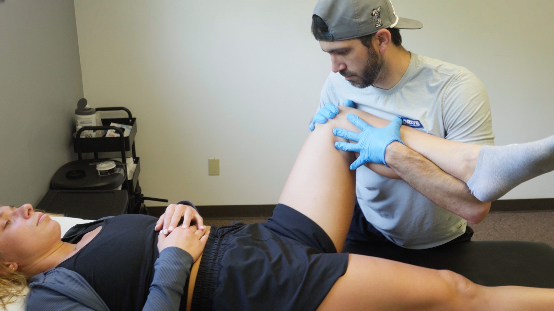 Patient receiving one-on-one manual therapy from a physical therapist at a sports physical therapy clinic in Saratoga Springs, NY