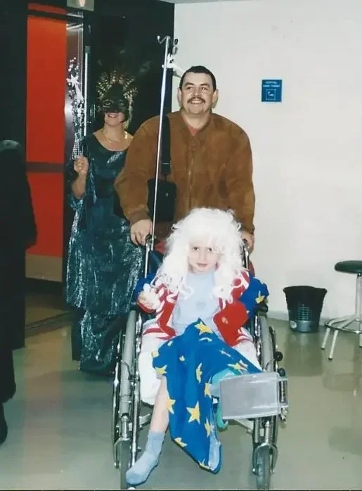 Founder sitting outdoors in a wheelchair