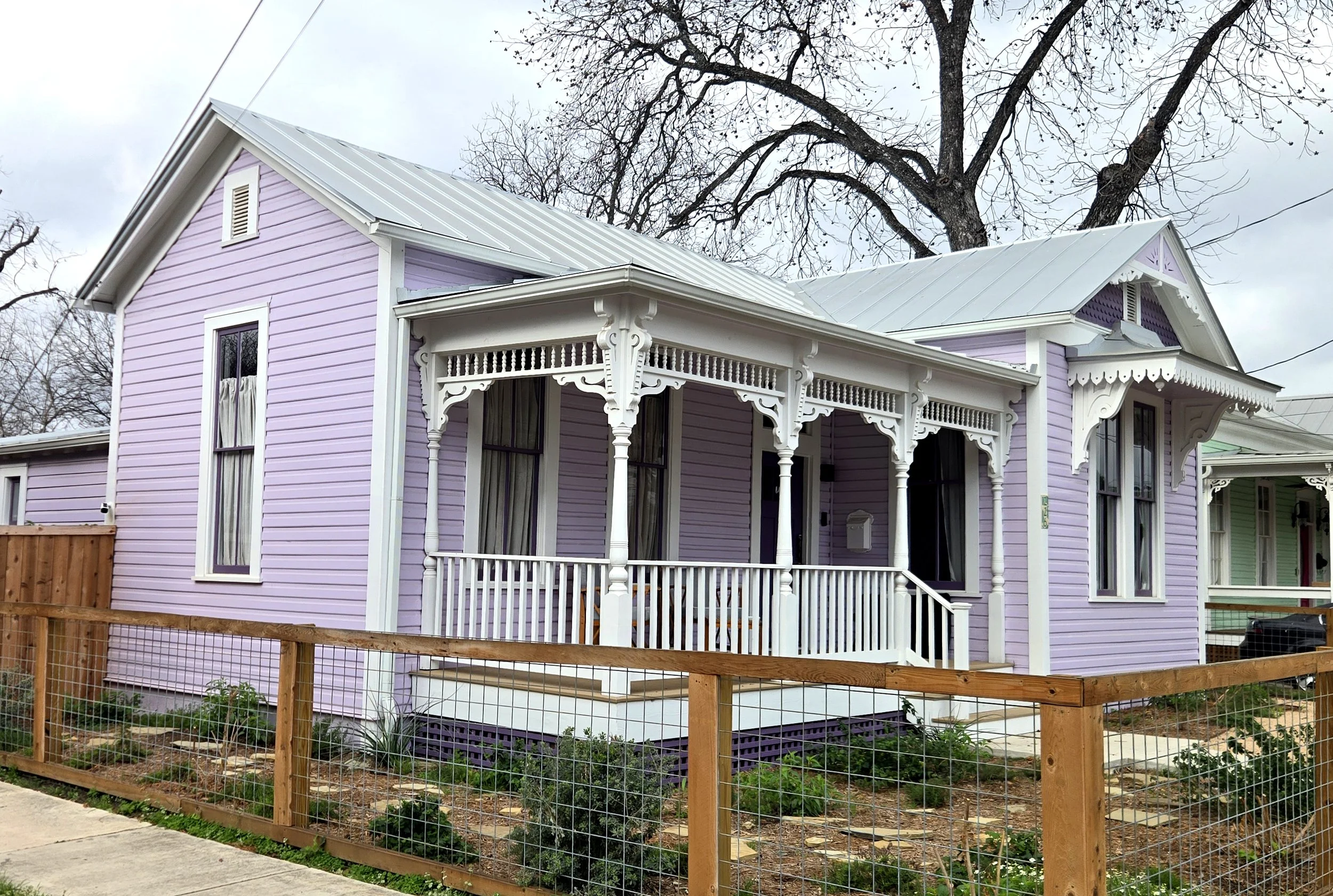 Queen Anne style home with gingerbread porch in Southtown San Antonio