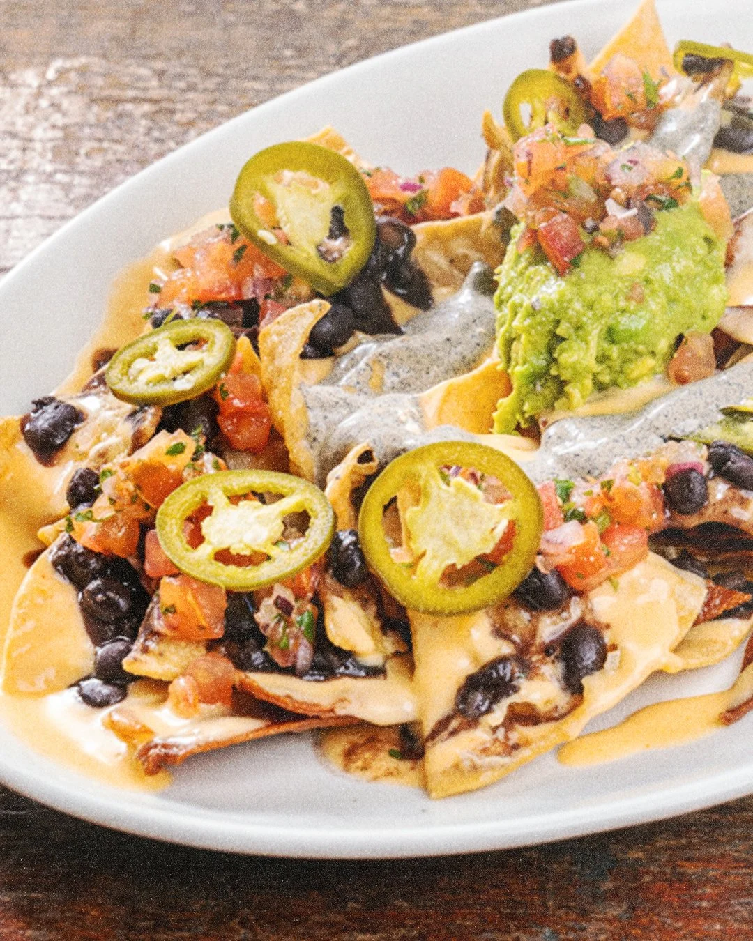 $15 NACHOS! EVERY WEDNESDAY!⁠
house made totopos loaded with fresh guac, pico, queso, black beans, burnt spring onion crema &amp; pickled jalape&ntilde;os!⁠
⁠
ready when you are x