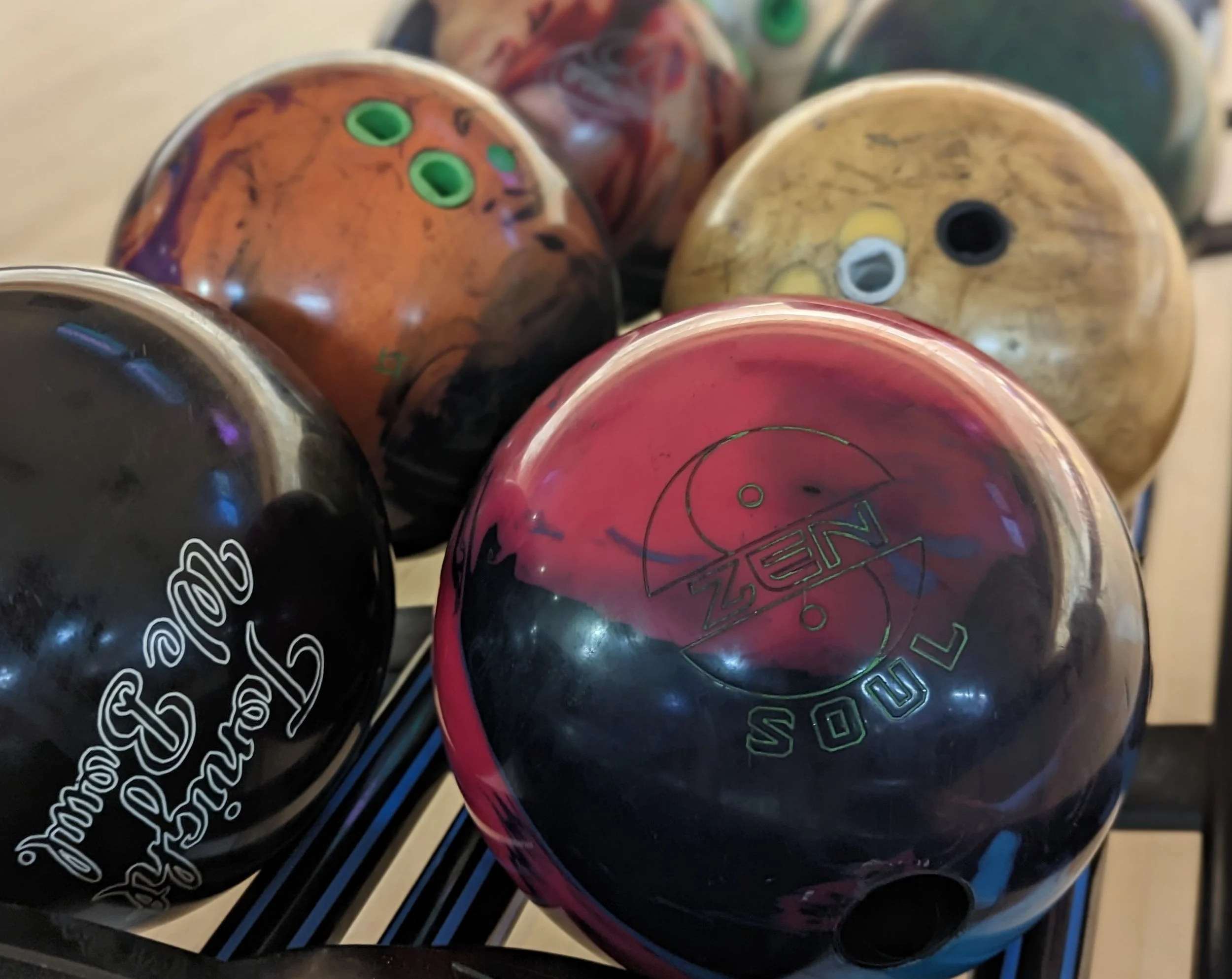 Dirty bowling balls on a return.