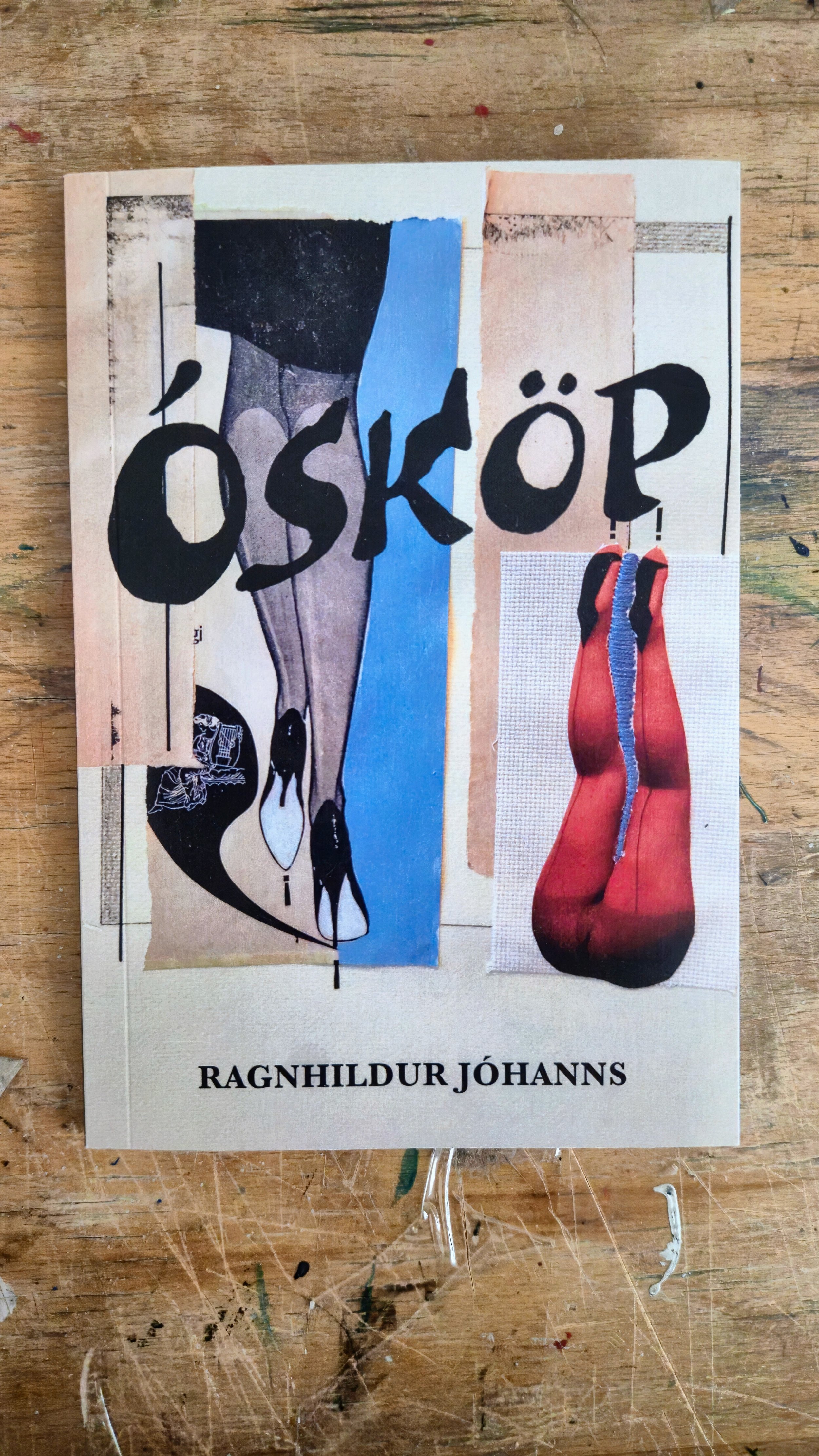 A collage with abstract and figurative elements, including a pair of legs, the word "ósköp" in large black letters, and the author's name Ragnhildur Jóhanns at the bottom.