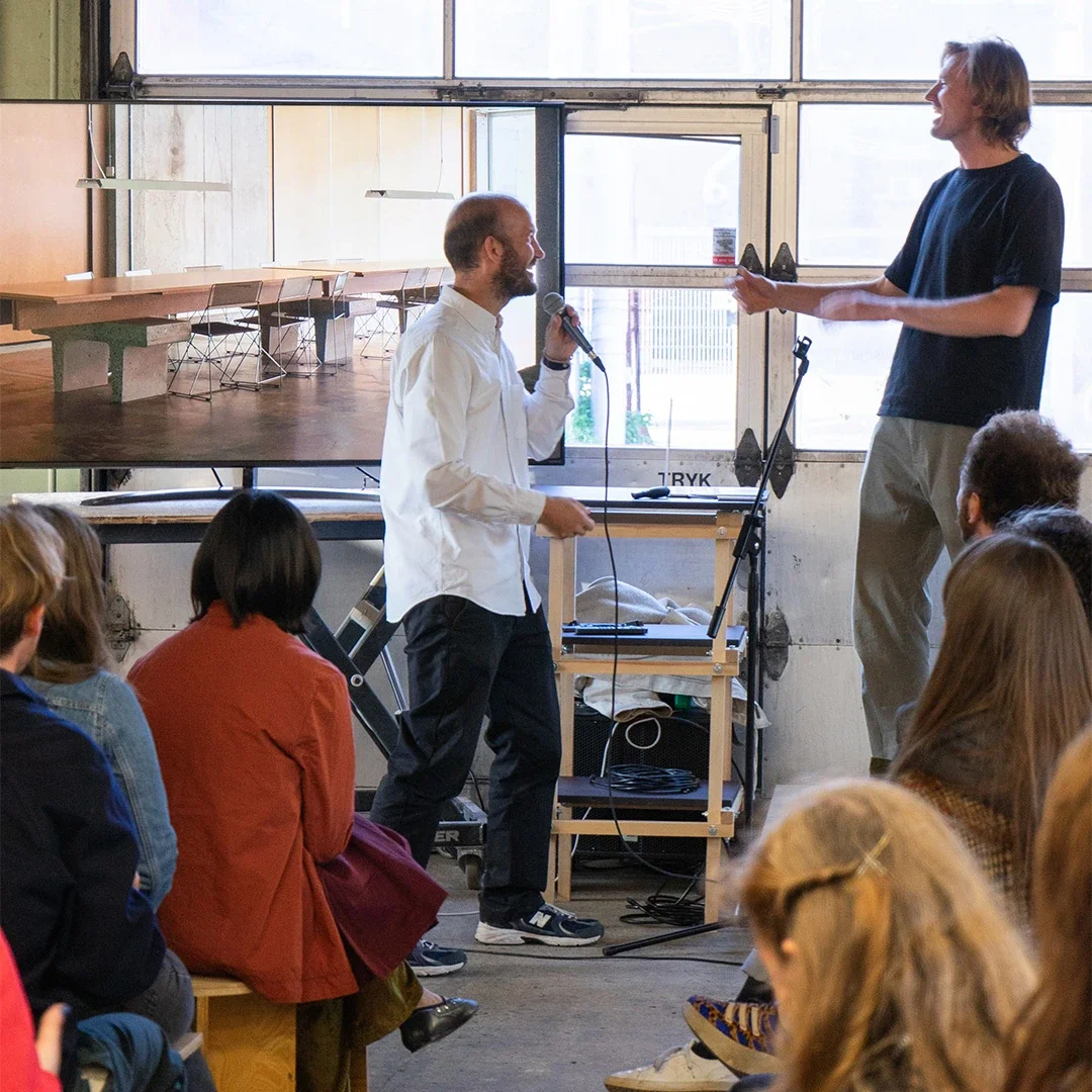 People talking on a stage