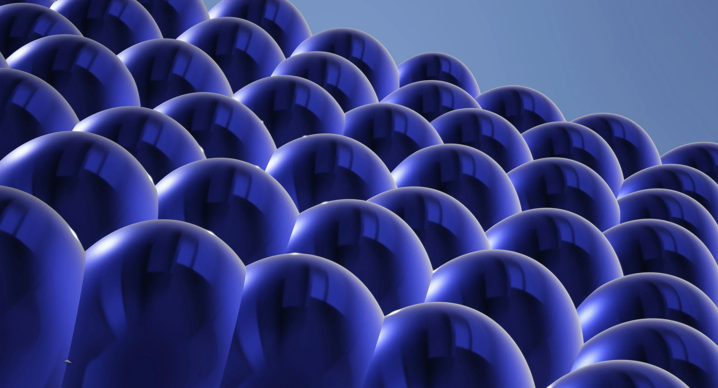Field of glossy cobalt-blue spherical forms, representing OMDB's Consulting offer