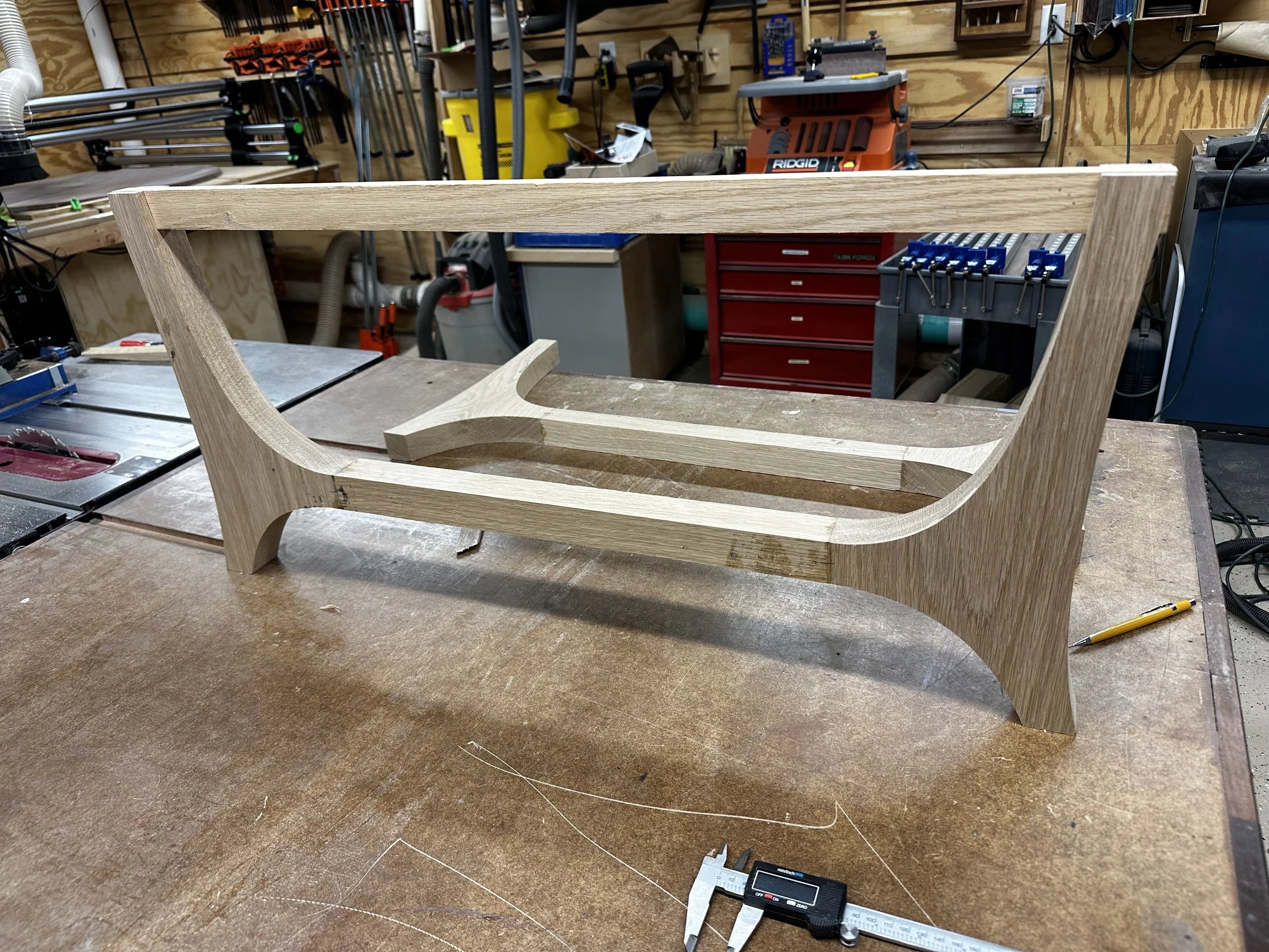 Completed white oak dining table base assembled in the shop using Festool Domino joinery